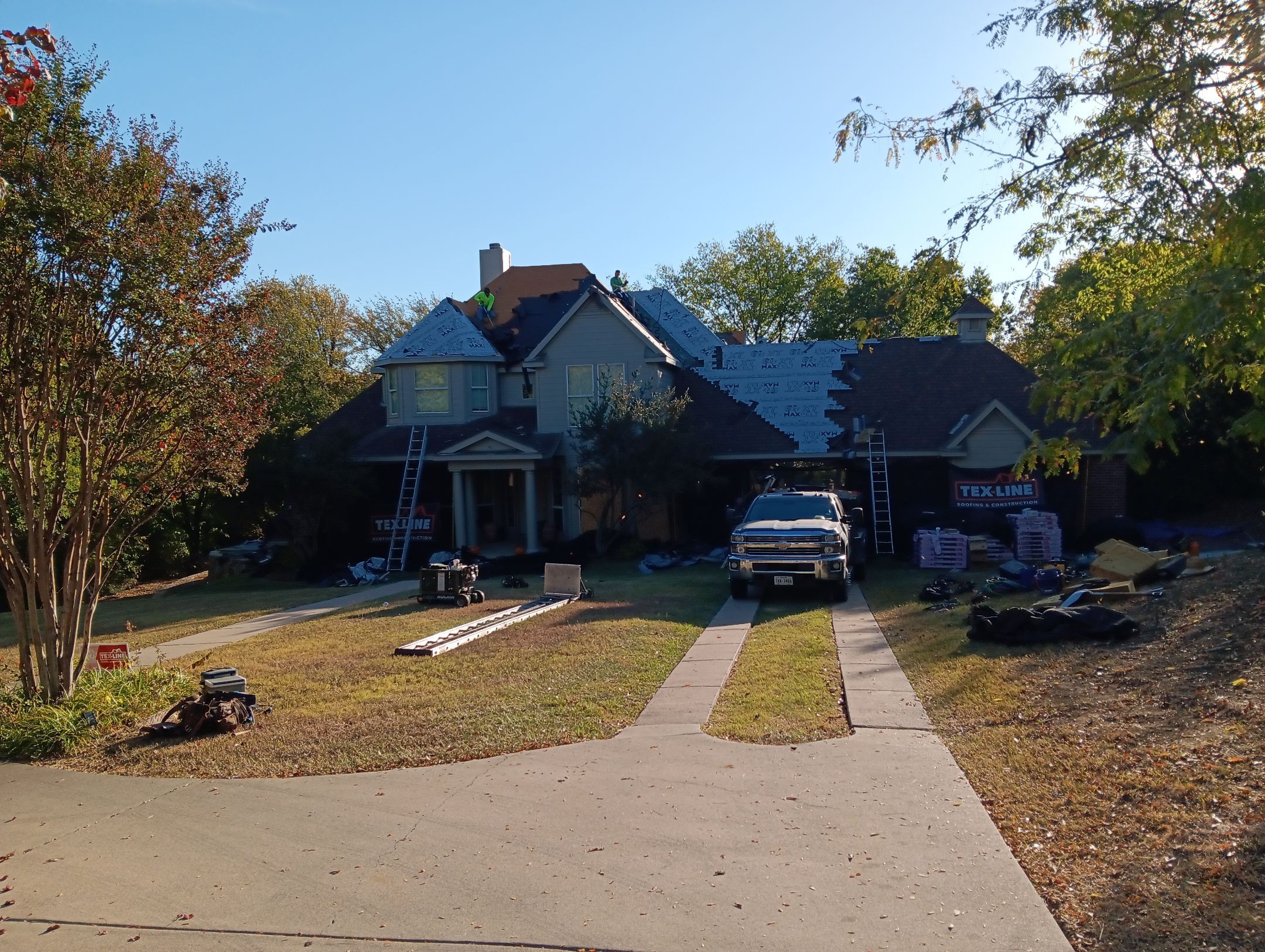 Insurance Claim Roof Paint and Gutters by Tex-Line Roofing