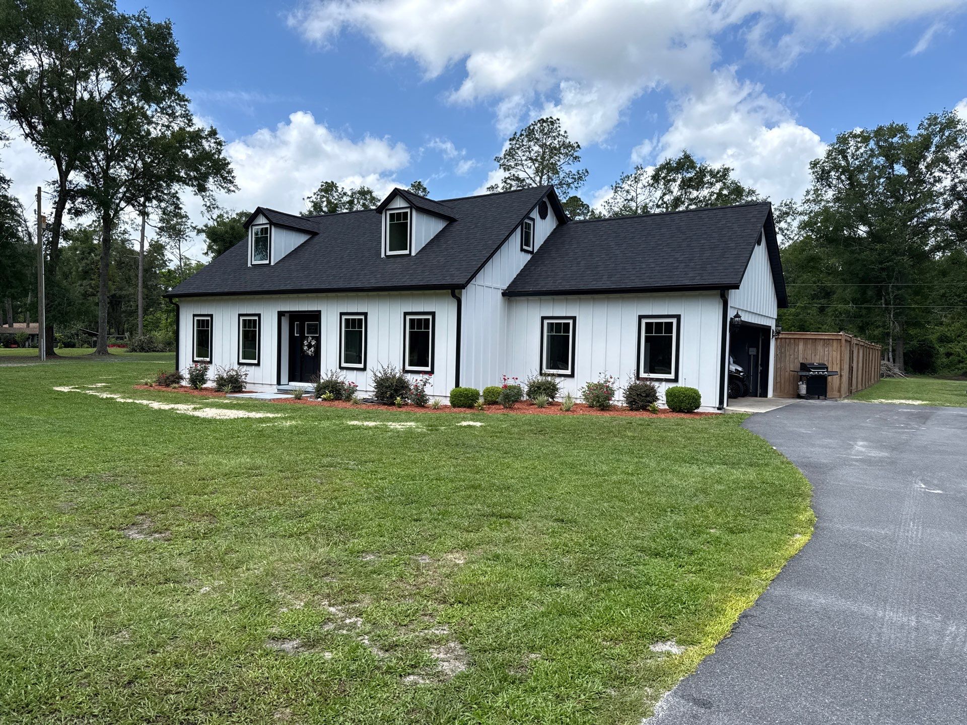 Andersen Window Installation for Modern Live Oak Farmhouse by Windows & Doors Store