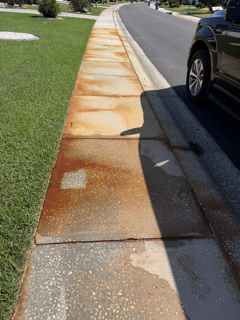 Professional Rust Removal for Concrete Sidewalk in Sun City Center by Supreme Paver Experts