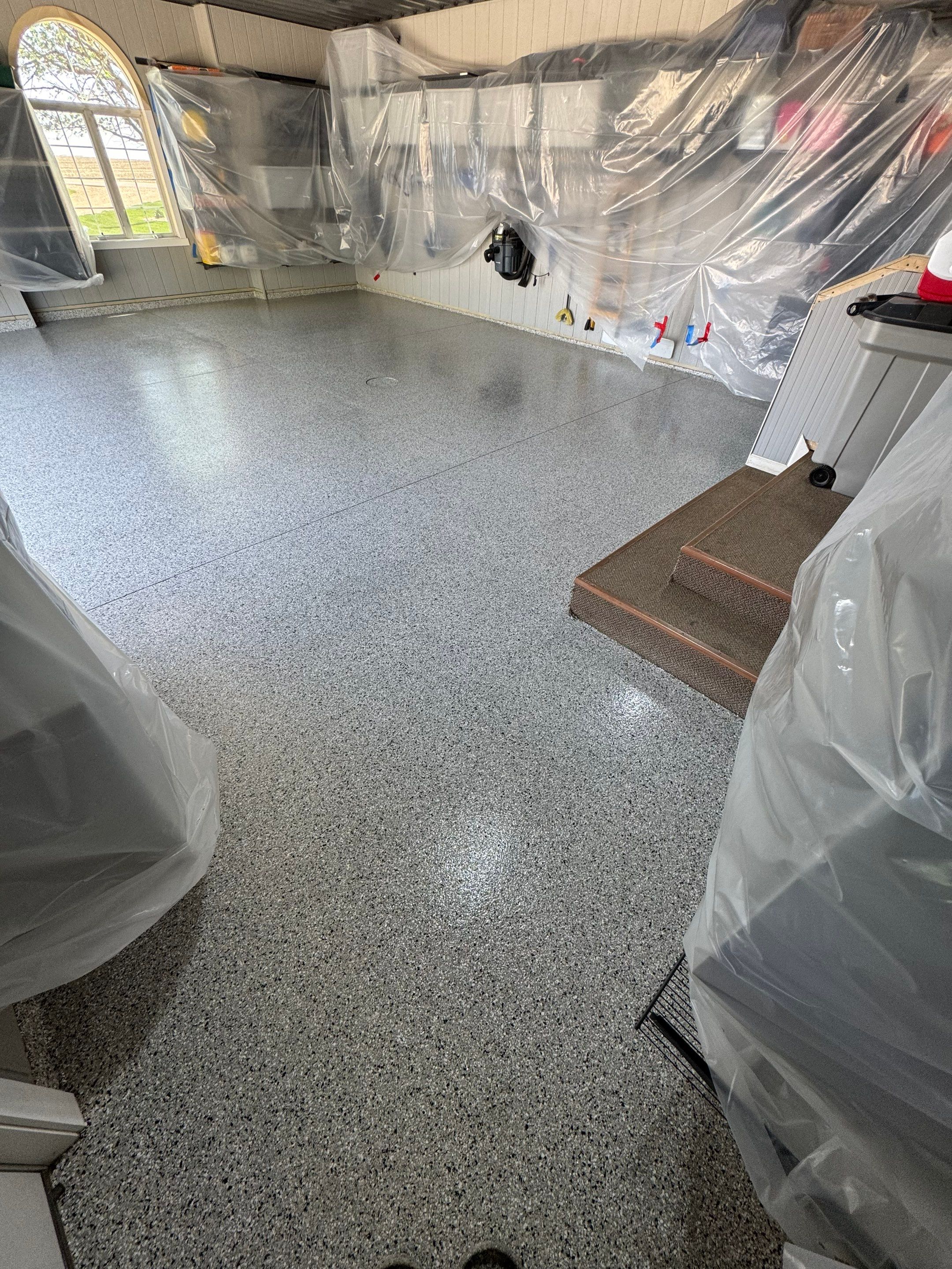 High-Gloss Grey Epoxy Floor Coating for Inwood Garage by Select Painting, Coatings & Garage Cabinets