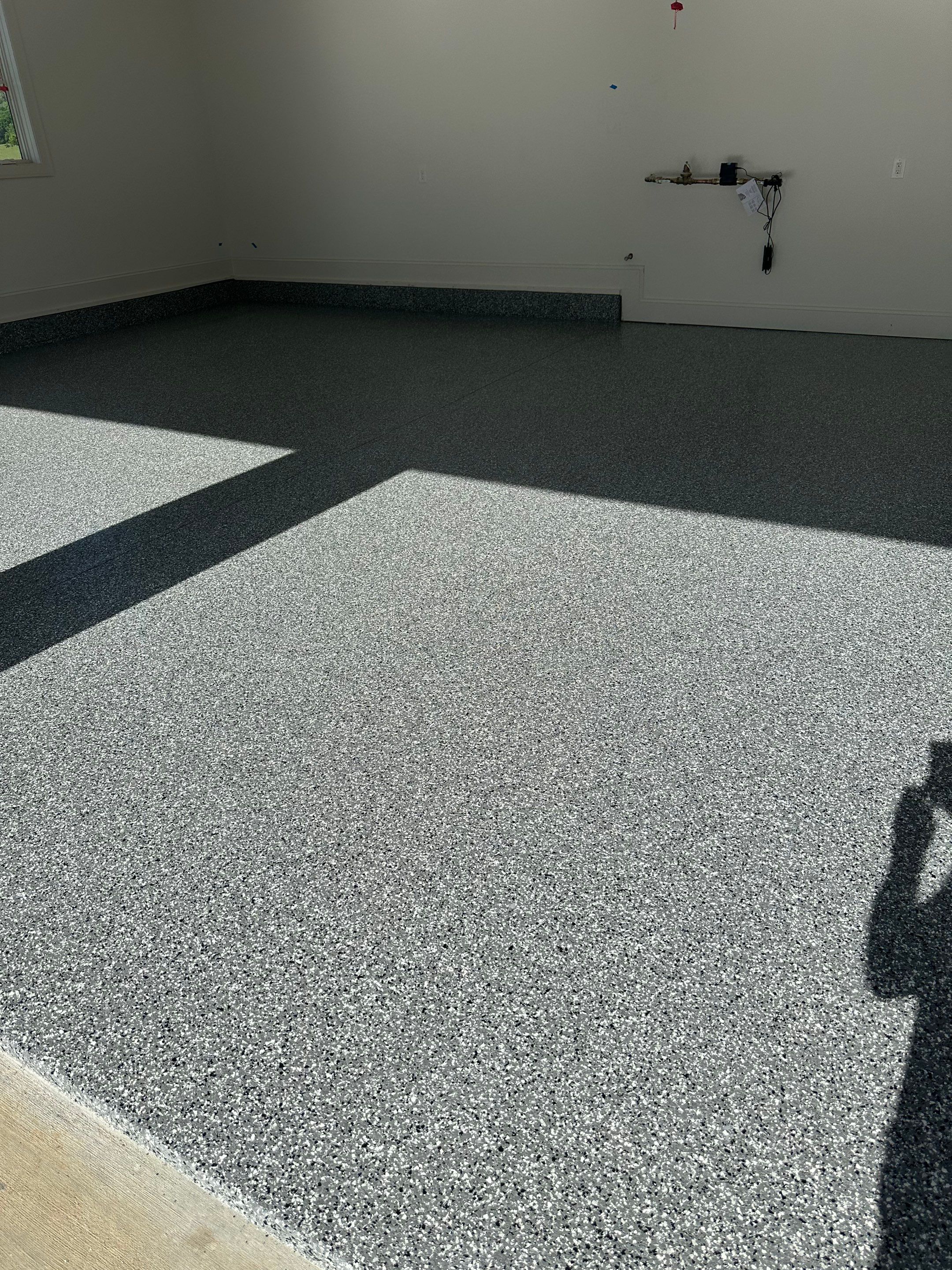 Garage Floor Coating using Wombat by My Garage Floor Guys