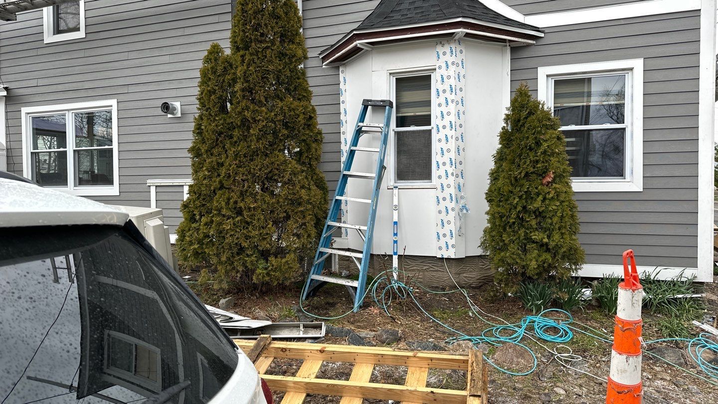 Siding Installation using Hardie Plank Aged Pewter by A Plus Exterior
