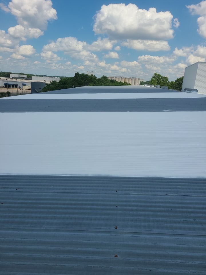 Commercial Metal Restoration System using Aldocoat Coatings by Hostetler Roofing