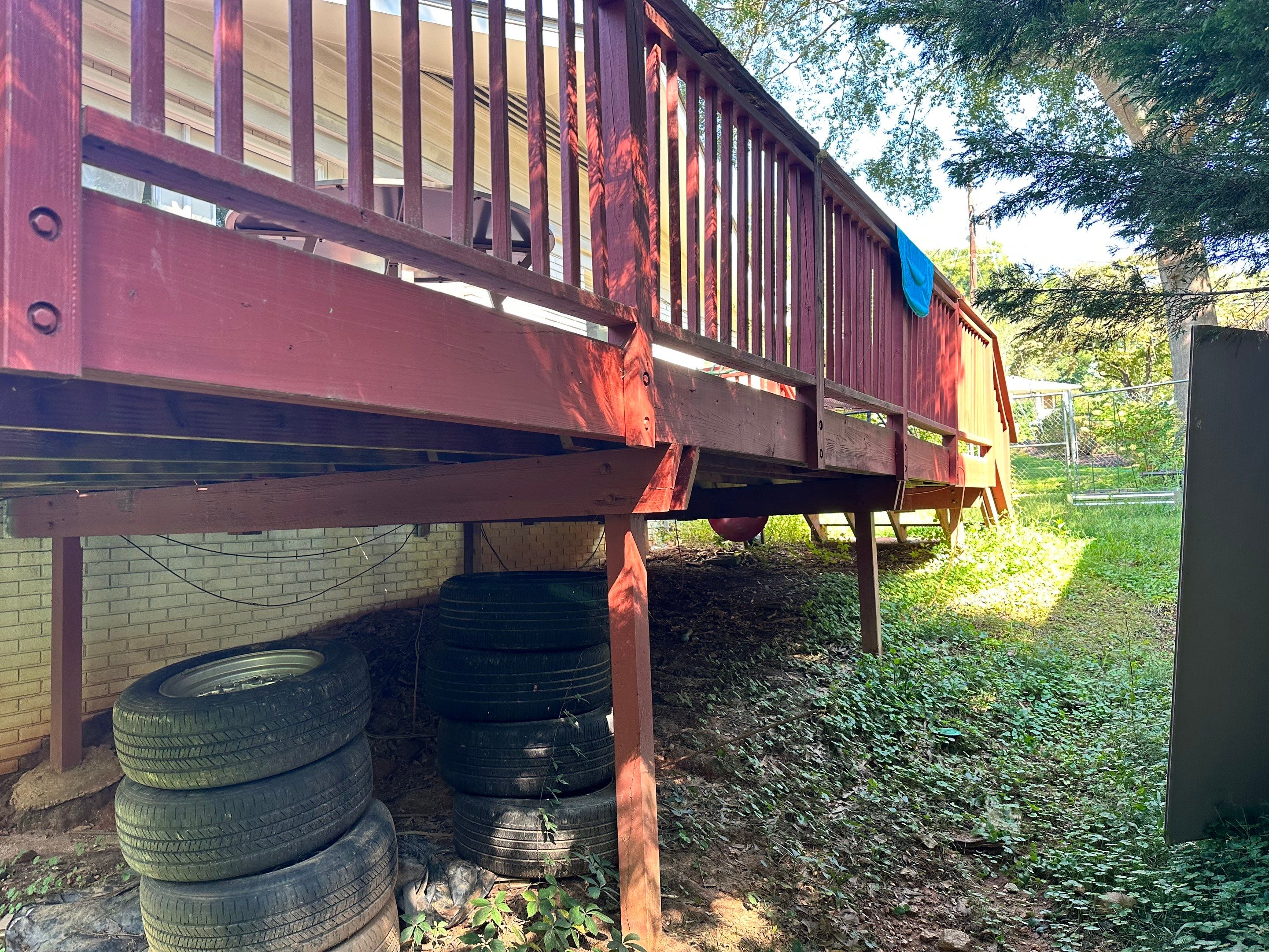 Elevated Composite Deck Rebuild With Metal Balusters in Marietta by Swift Home Renovations