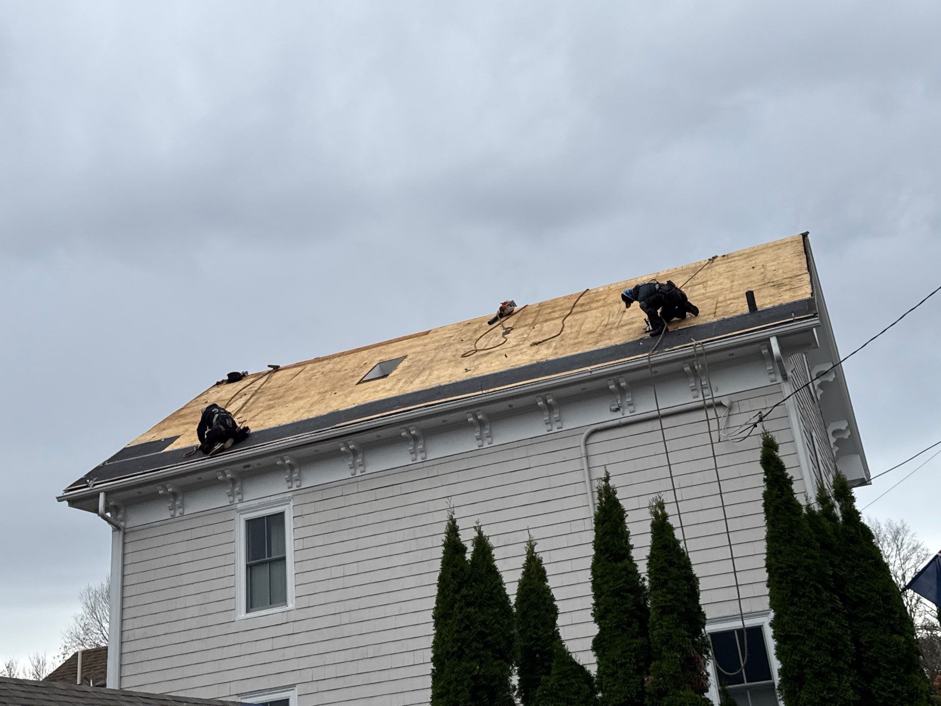 Newburyport Complete Roof Replacement with Solar Venting Skylight by Mighty Dog Roofing of Greater Middlesex County