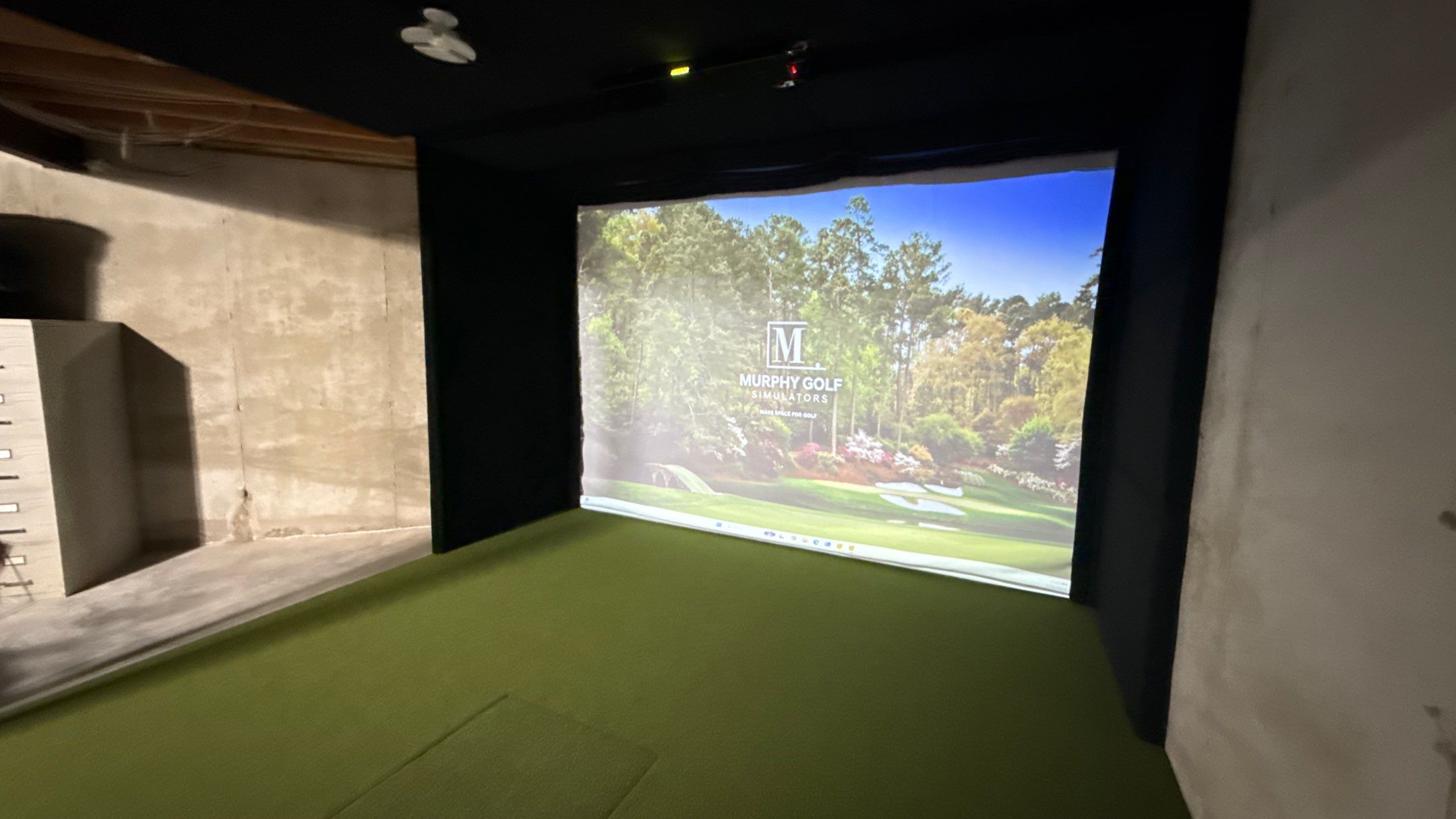 Rex Went With A Custom Golf Simulator  by Banner Garage
