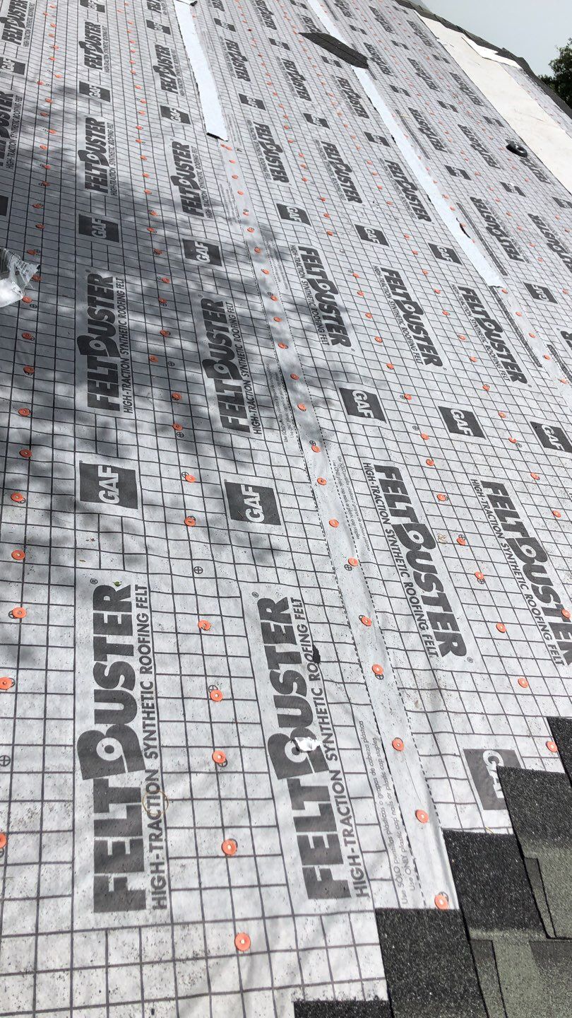 Residential Roofing Installation using Roof Replacement by American Roofing & Construction LLC