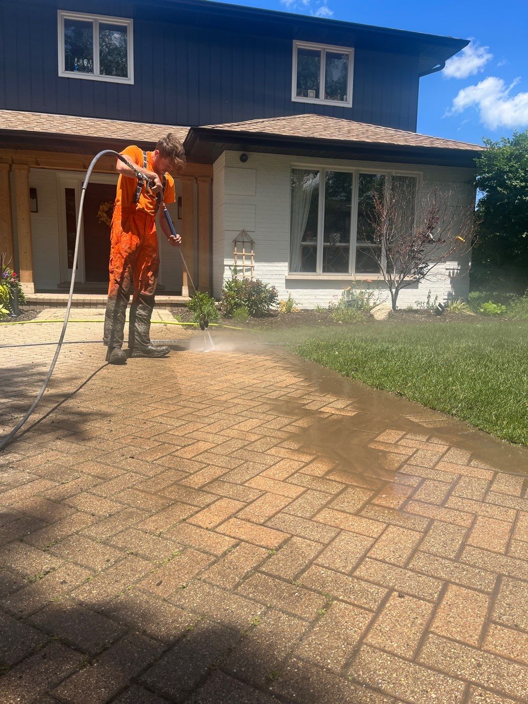Brick paver repair, cleaning and sealing by Northern Power Washing LLC.