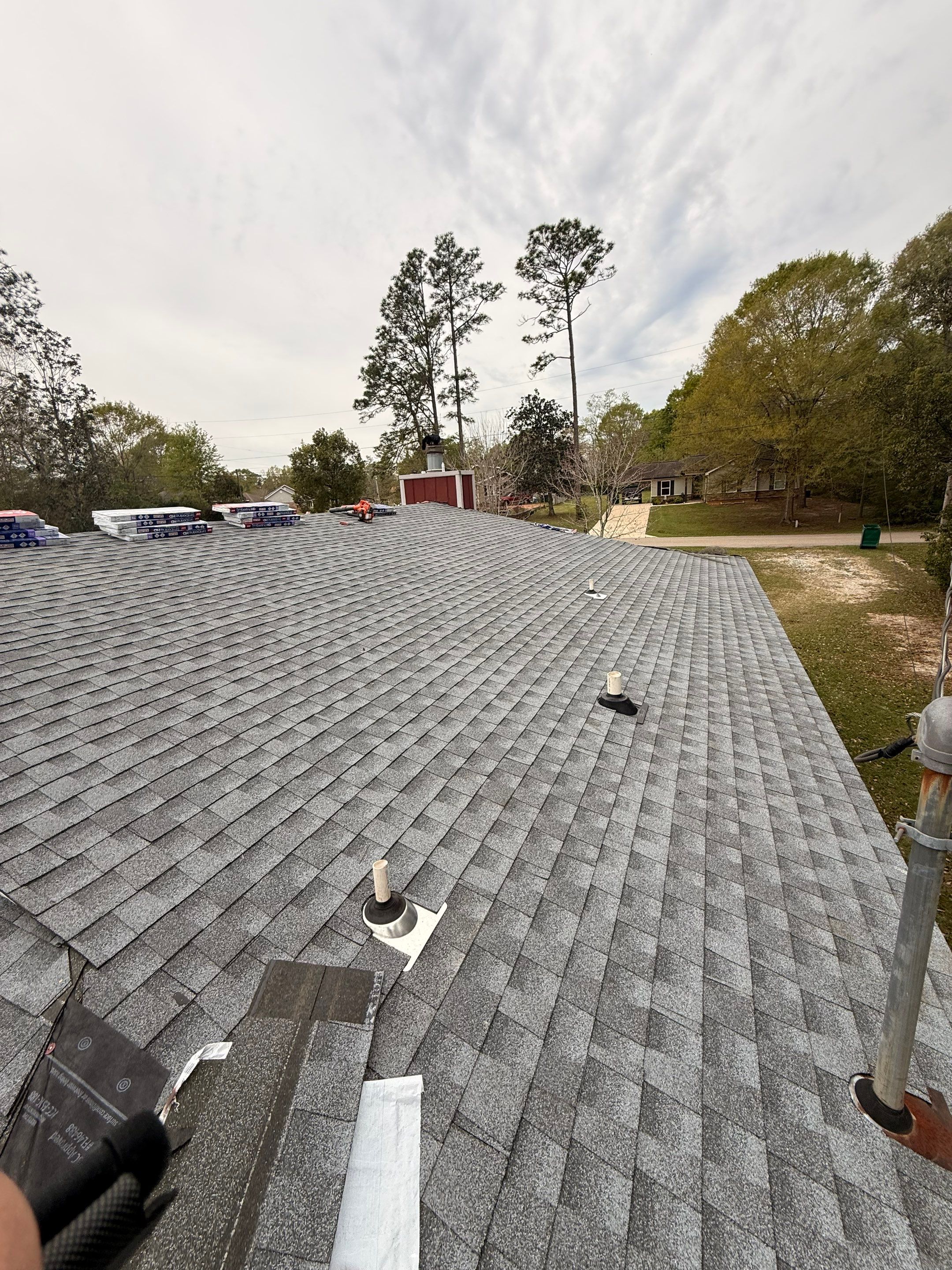 Full Asphalt Shingle Roof Replacement and Decking Repair in Carriere by Frontline Roofing