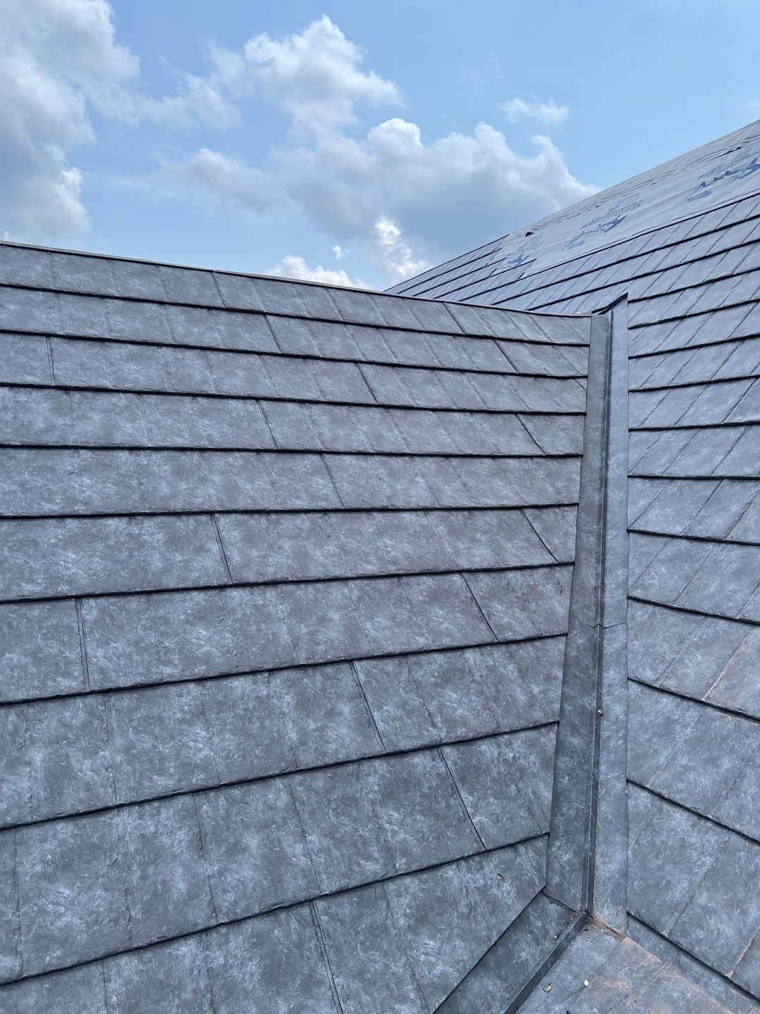 Residential Roofing Installation using ProVia Ironstone Slate Metal Roofing by RoofX 