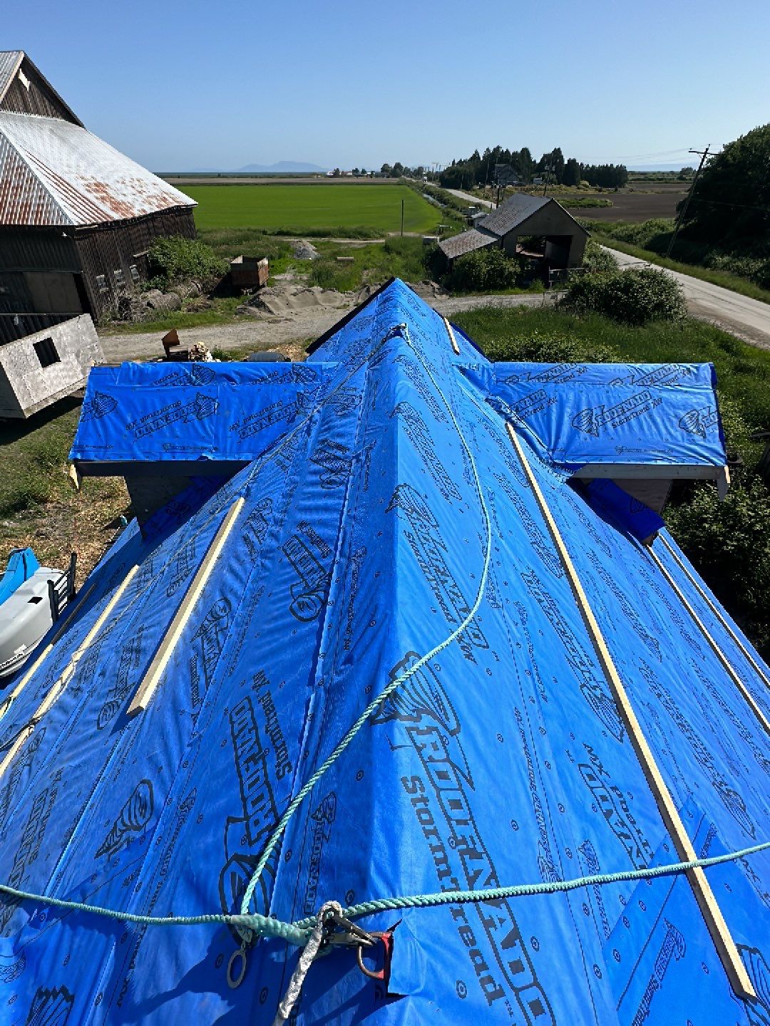 Agricultural Roofing Installation using 12" Prolok metal  by Top Notch Roofing Inc