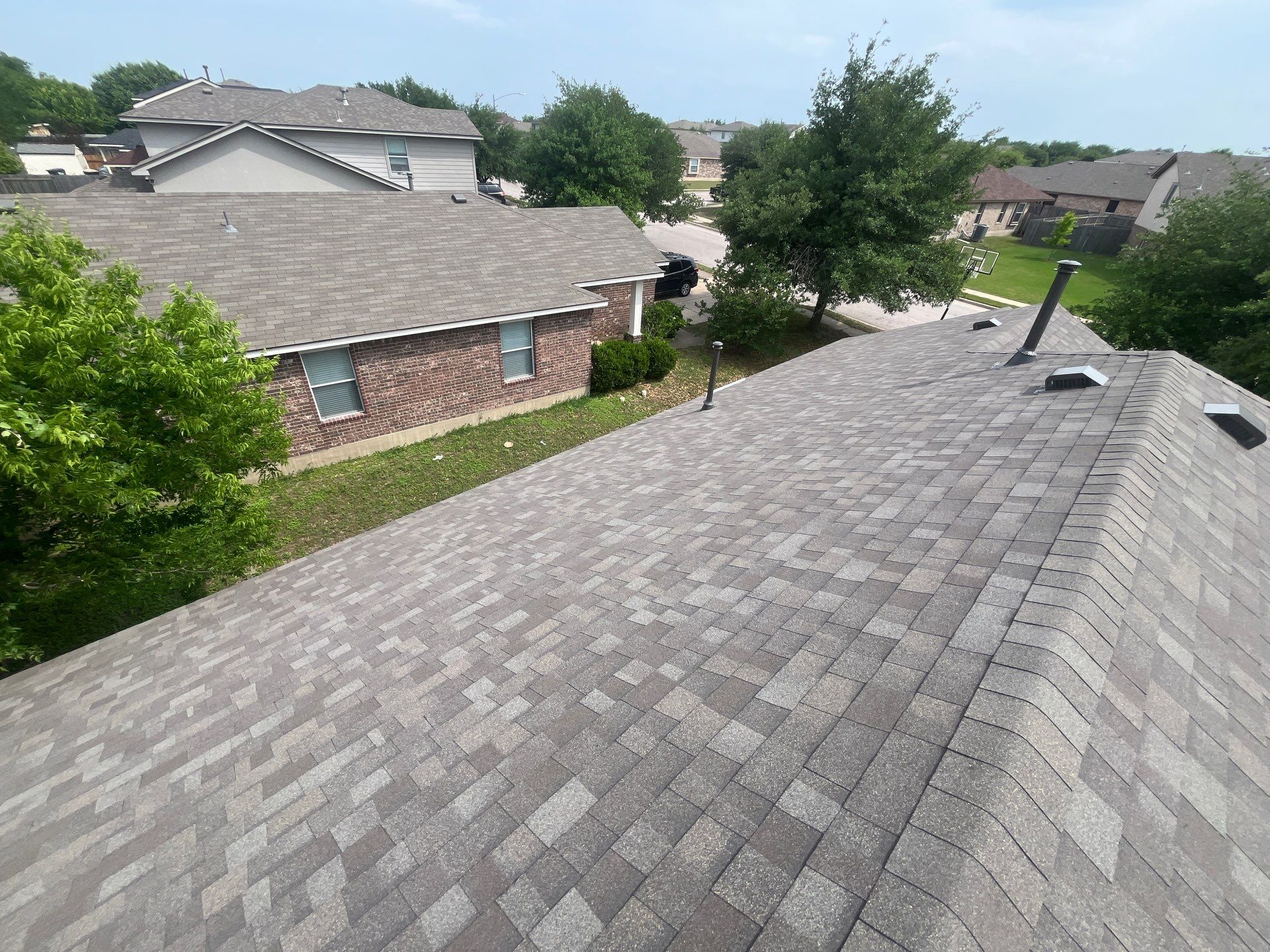 Residential Roofing Installation using Owens Corning Oakridge by Kstylez Roofing & Construction