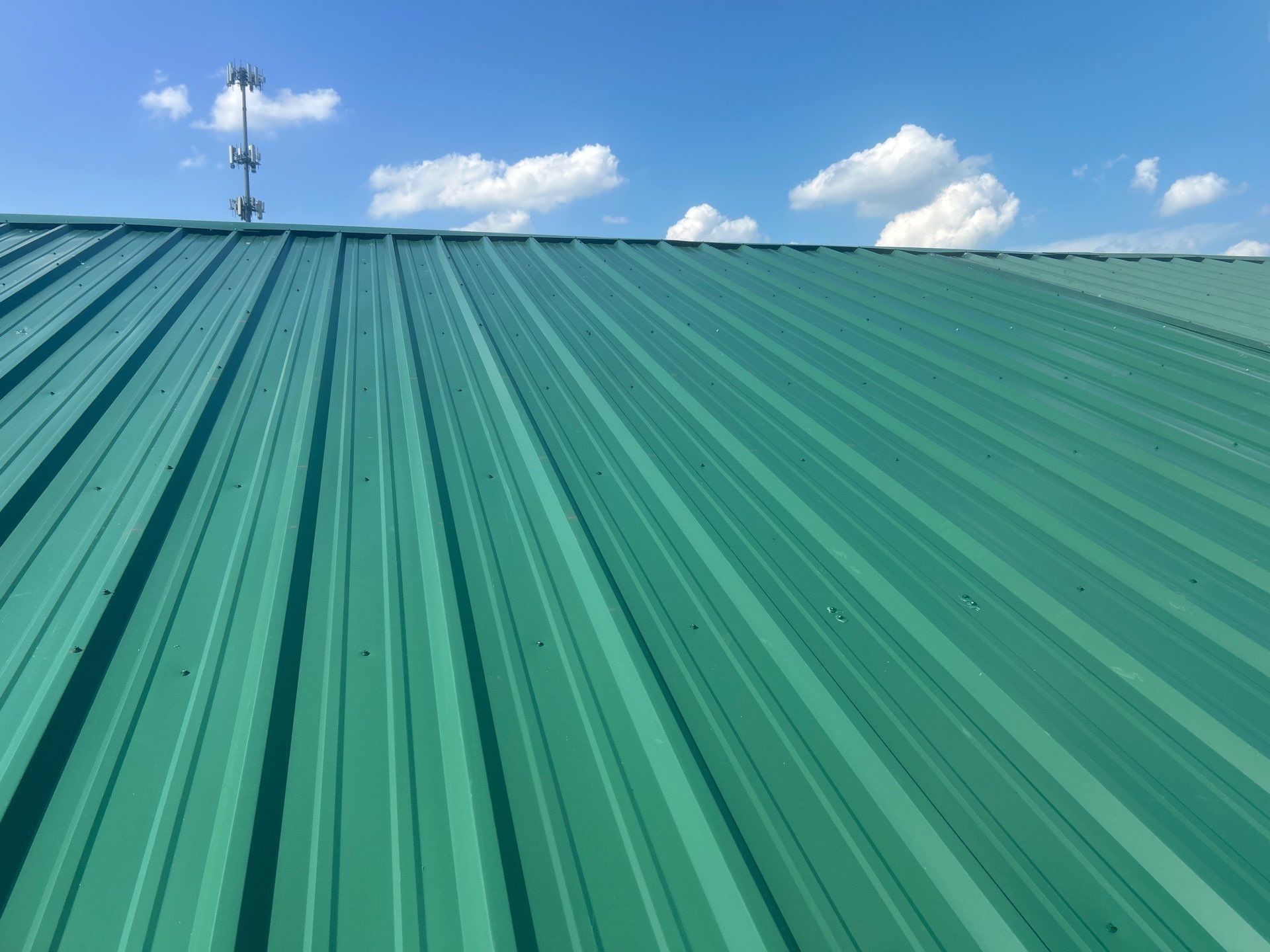 Commercial Roofing Repair using Ag panel green  by Nitro Roofing and Construction