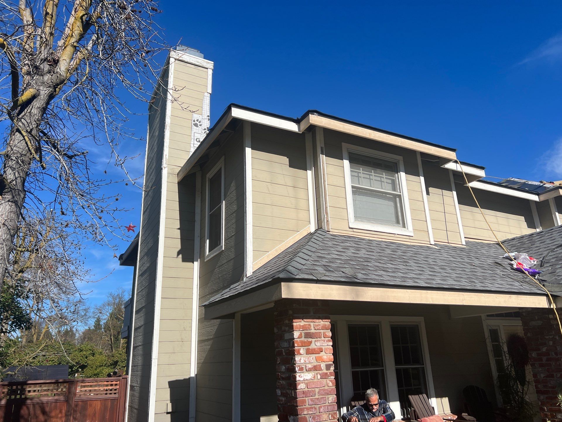 New shingles and gutters using GAF Timberline HDZ shingles and aluminum gutter by Straight Edge Roofing Inc