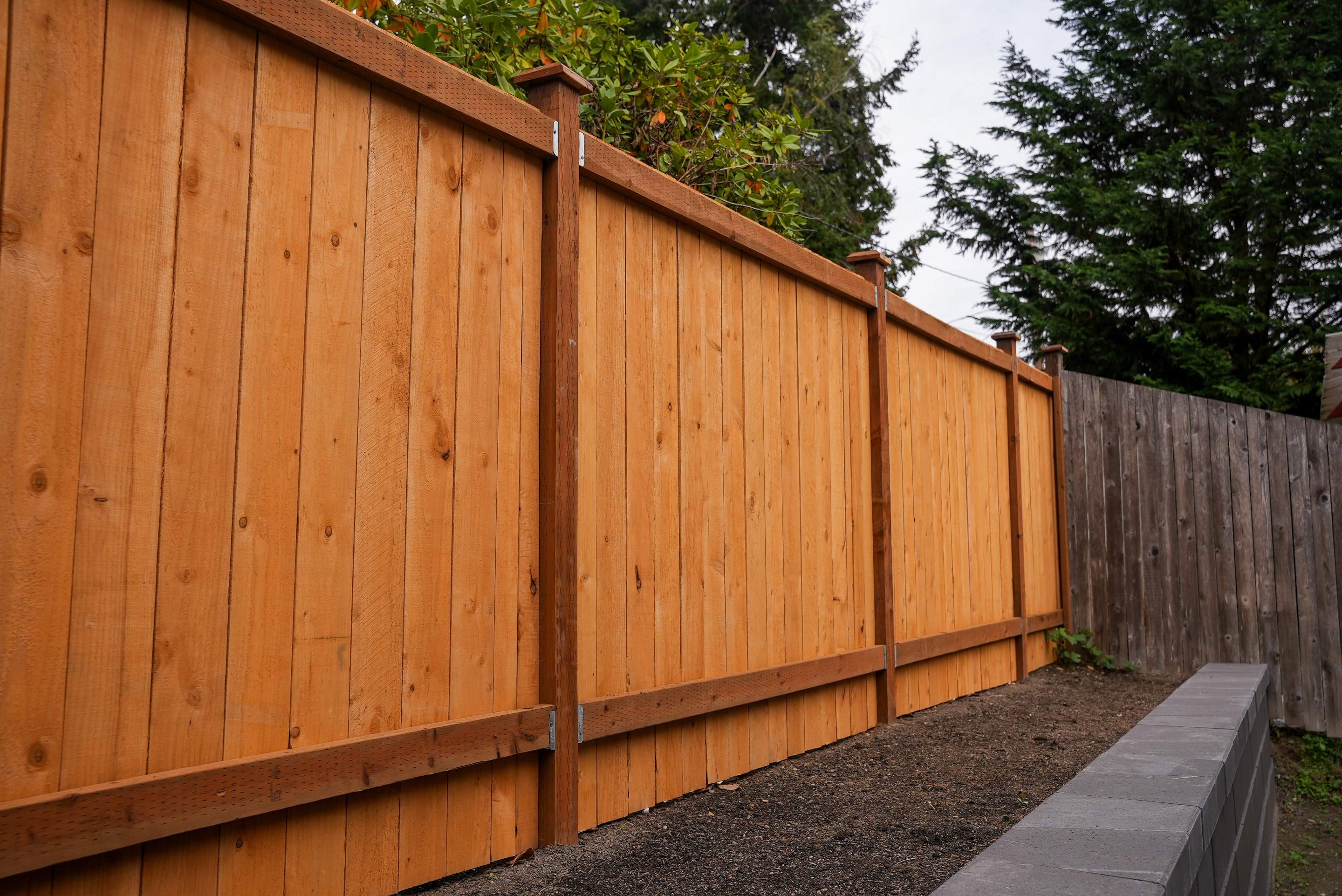 Jireh Outdoor Projects | Retaining Wall & Fence Build by Jireh Asphalt & Concrete Inc 