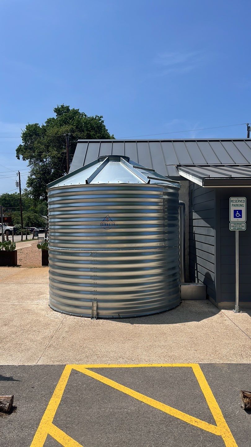 5000 gallon Wimberley Community Welcome Center using Meridian 5000 gallon, 30 degree pitched roof, silo style by Hill Country Rain Water