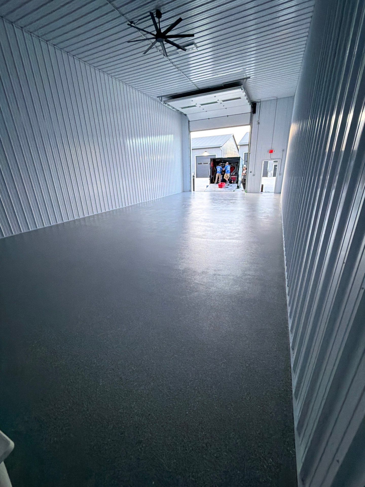 Commercial Storage Bay Epoxy Flake Floor Installation in North Muskegon by Gordon Painting