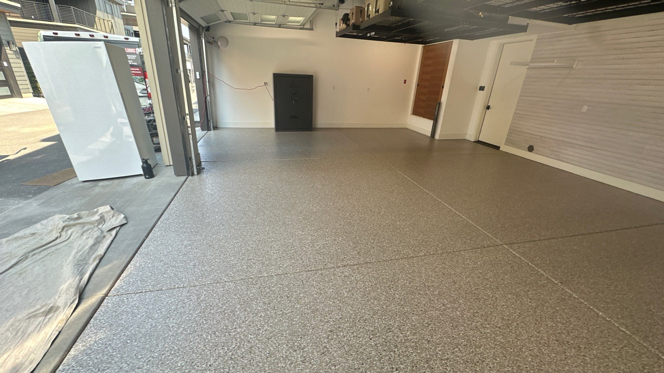 Garage Transformation using Pebble Beach by Croc Coatings, LLC