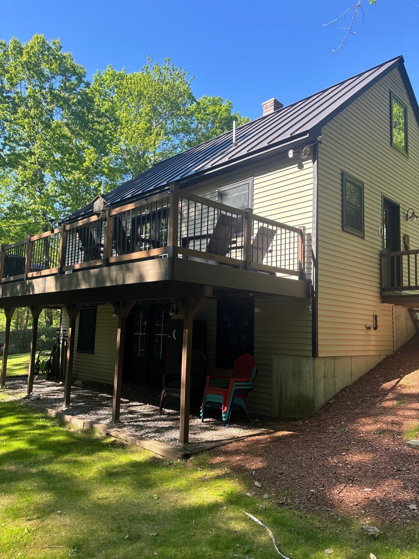 Sage Green Board and Batten Siding and Deck Upgrade in Standish by Tall pine roofing