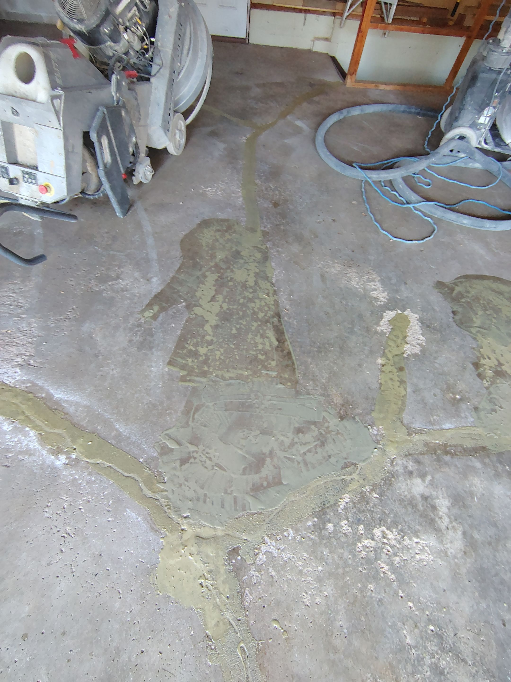 Sioux Falls Garage Epoxy Floor Installation and Concrete Crack Repair by Select Painting, Coatings & Garage Cabinets
