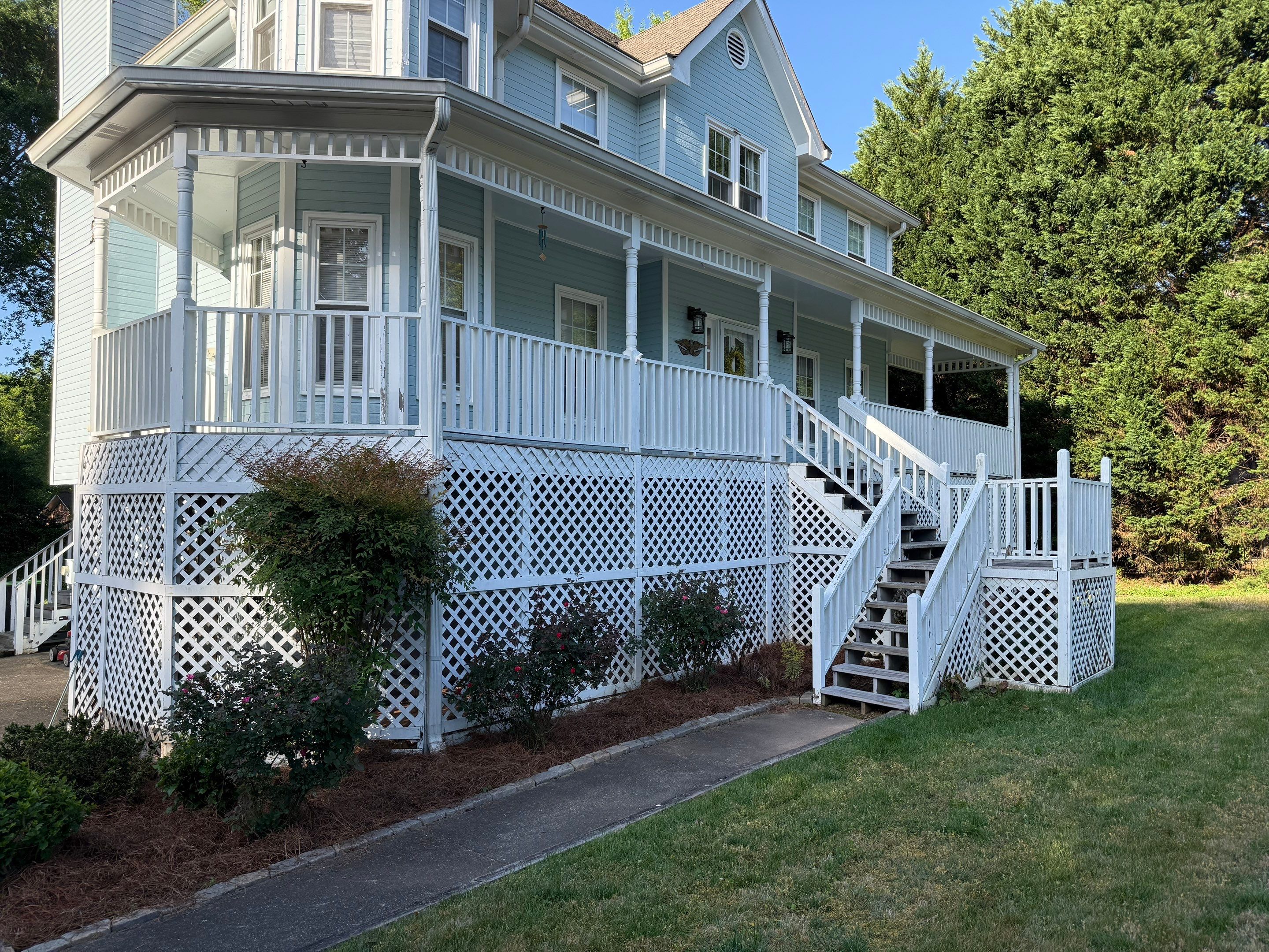 Marietta Porch Upgrade with Horizontal Pressure-Treated Wood Slats by Swift Home Renovations