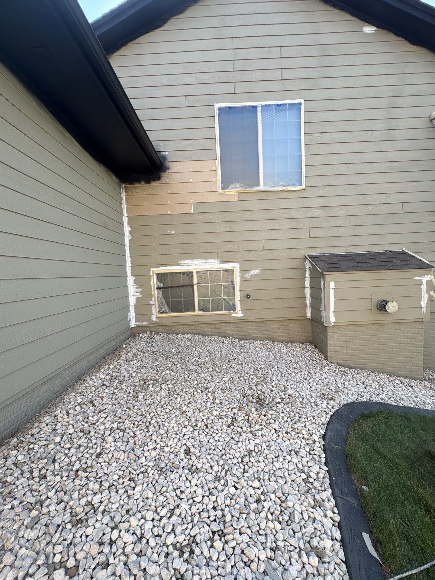 Residential Exterior Painting and Siding Refresh in Sioux Falls by Select Painting, Coatings & Garage Cabinets