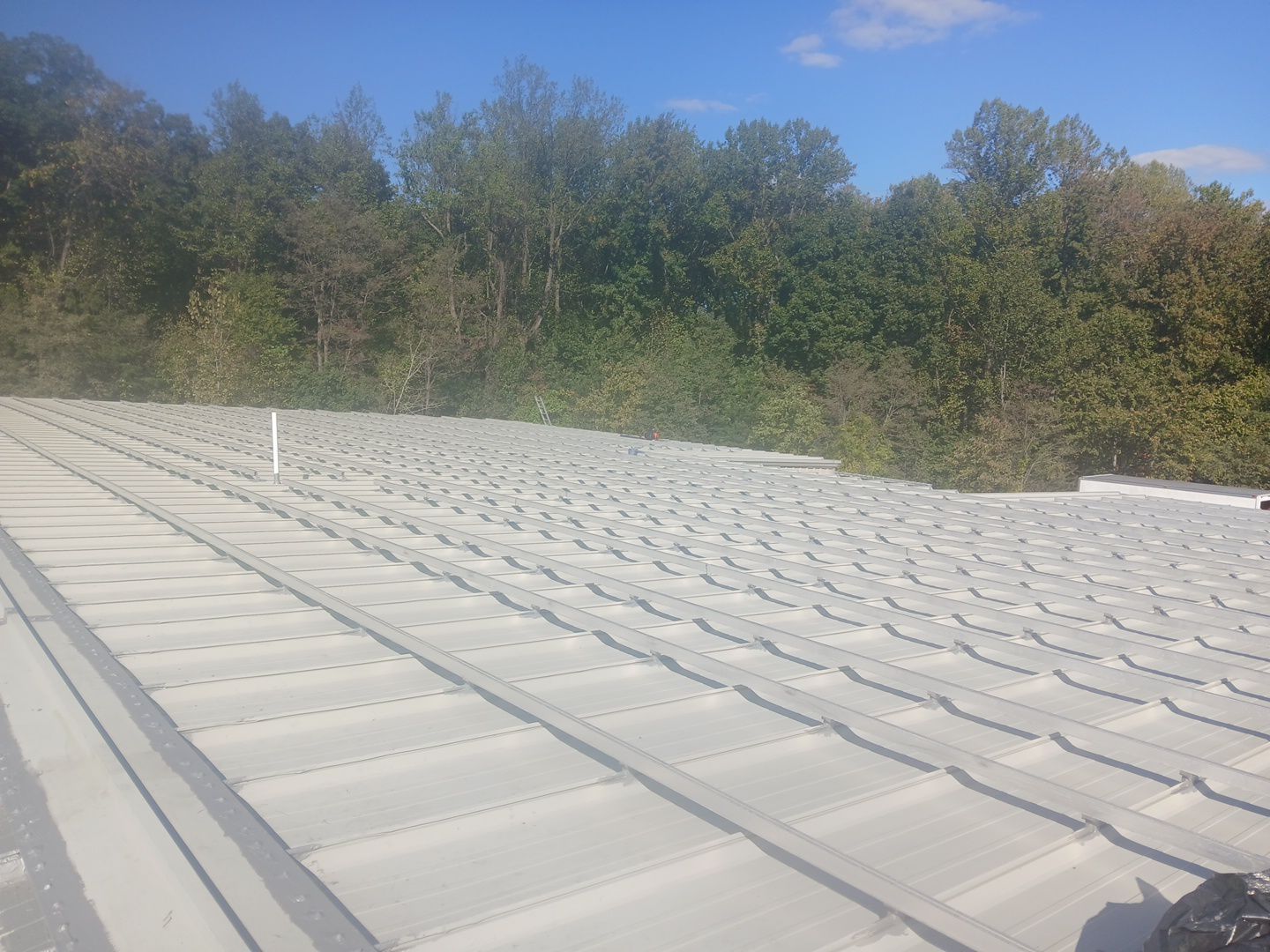 Commercial Roof using GACO Flex Silicone and Metal Acrylic by ExteriorPros