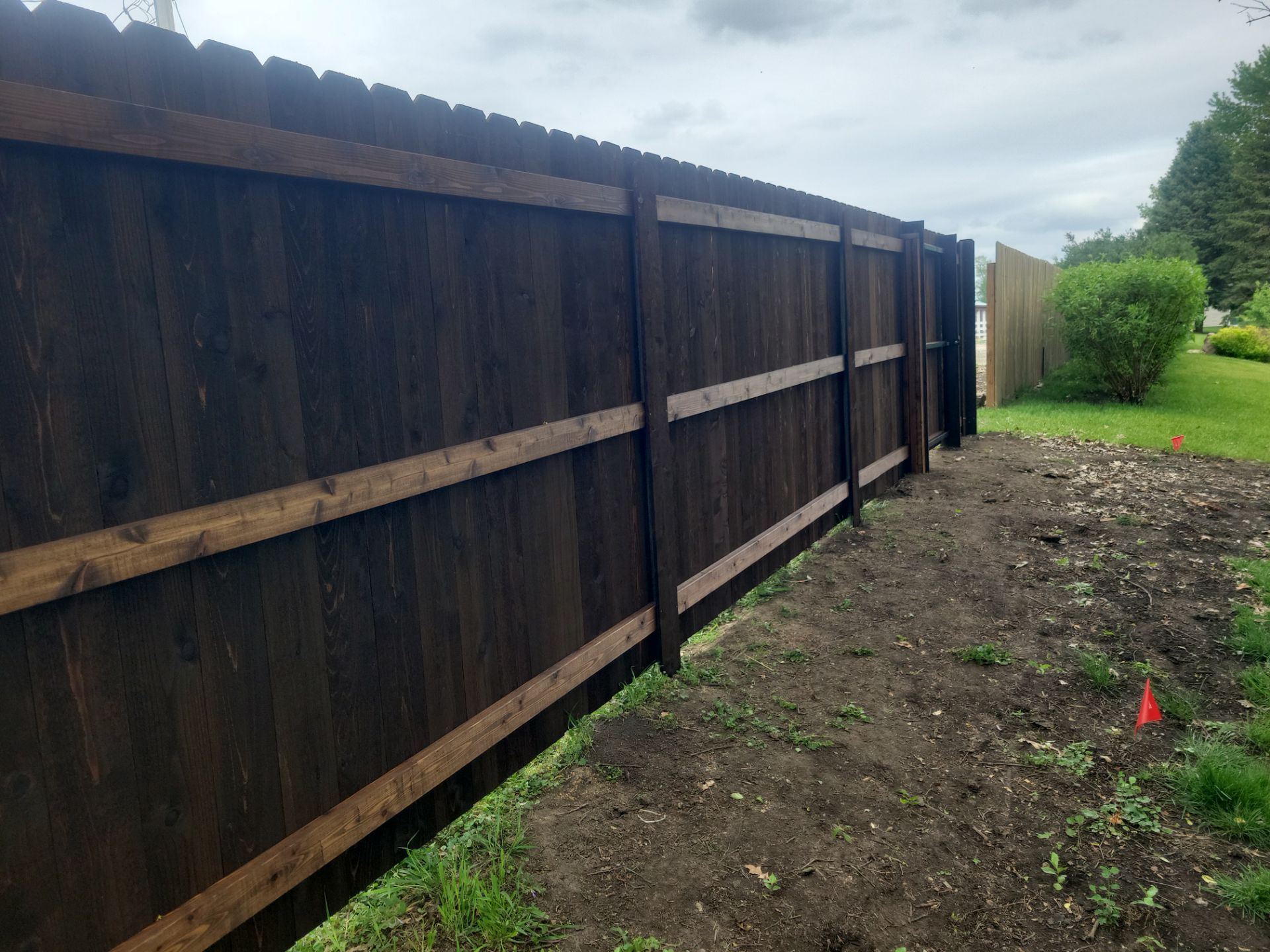 Chain Link and Cedar Privacy in Grundy Center by Perfect Picket Fence and Stain