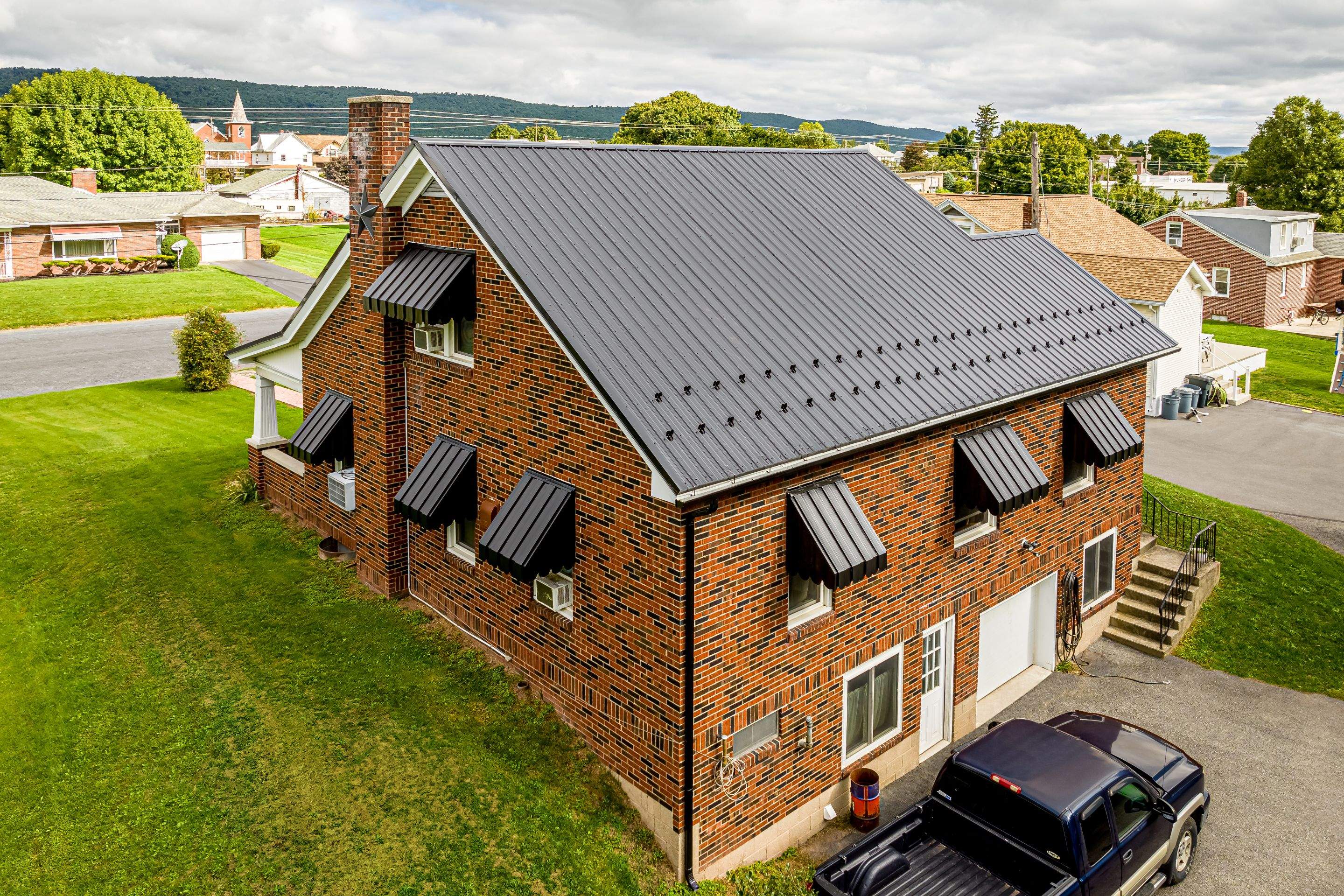 Metal Roof-black by Esh Builders