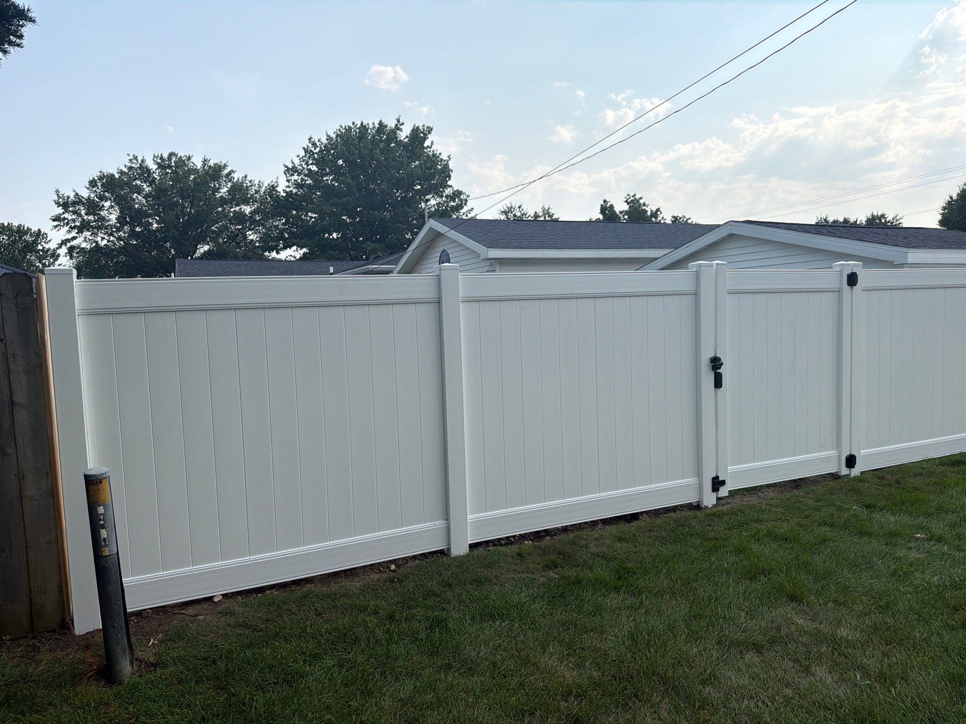 White Vinyl Privacy Fence Installation and Side Yard Upgrades in Waterloo by Perfect Picket Fence and Stain