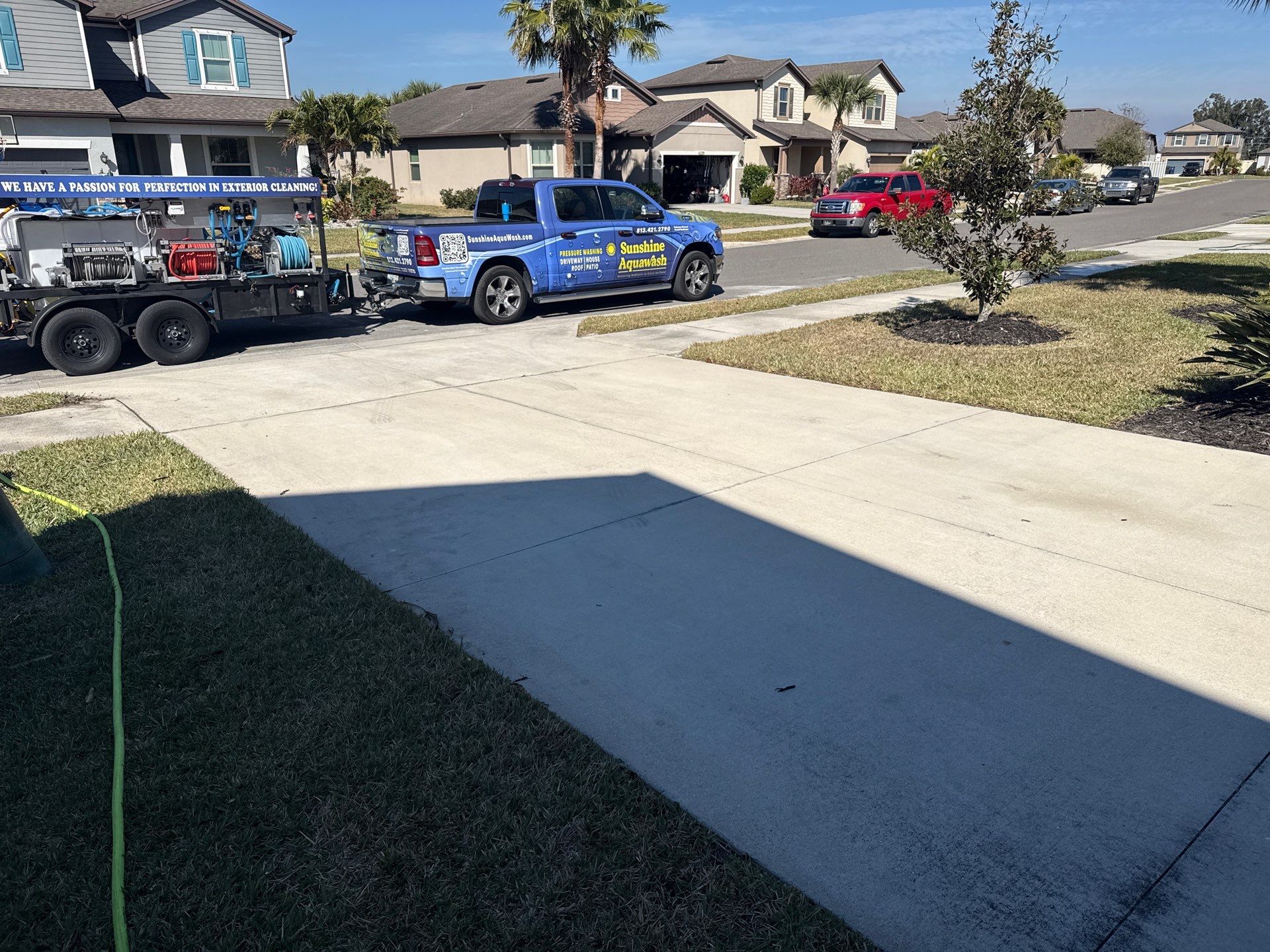 2-Car Concrete Driveway & Sidewalk Cleaning in Trevesta – Palmetto, FL by Sunshine AquaWash