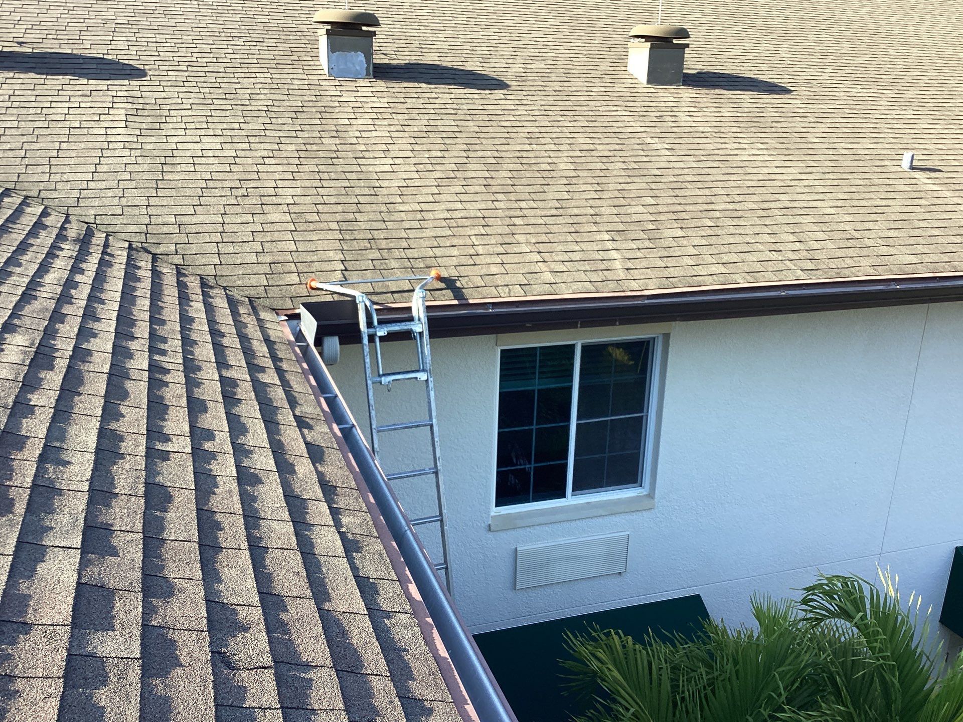 Musket Brown Seamless Gutters using Musket Brown Seamless Gutters in Capen Coral FL by Gutter Professors