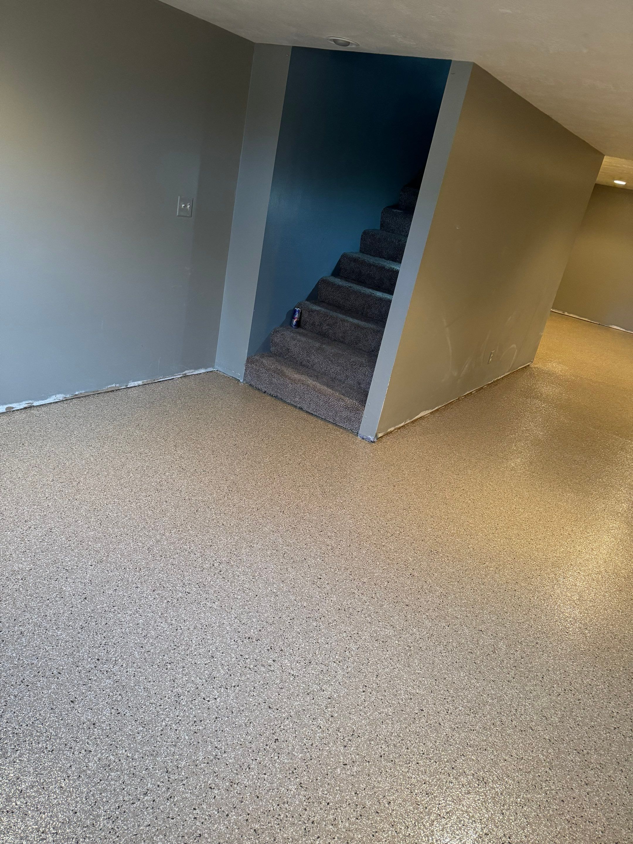 Custom Multi-Fleck Epoxy Floor Coating for Residential Basement by Select Painting, Coatings & Garage Cabinets