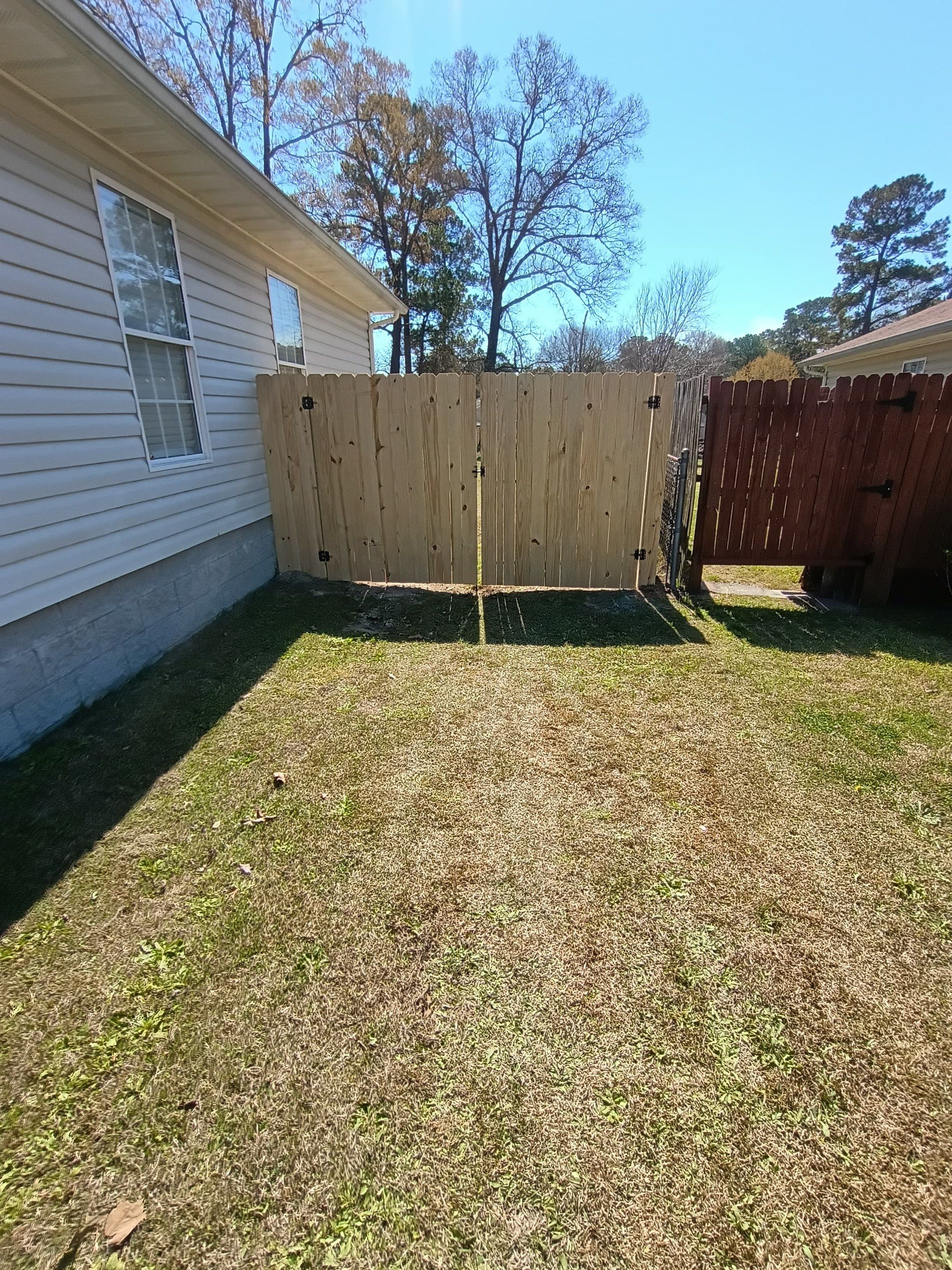Wood Privacy Fence Installation in Hubert, NC by Superior Fence and Rail
