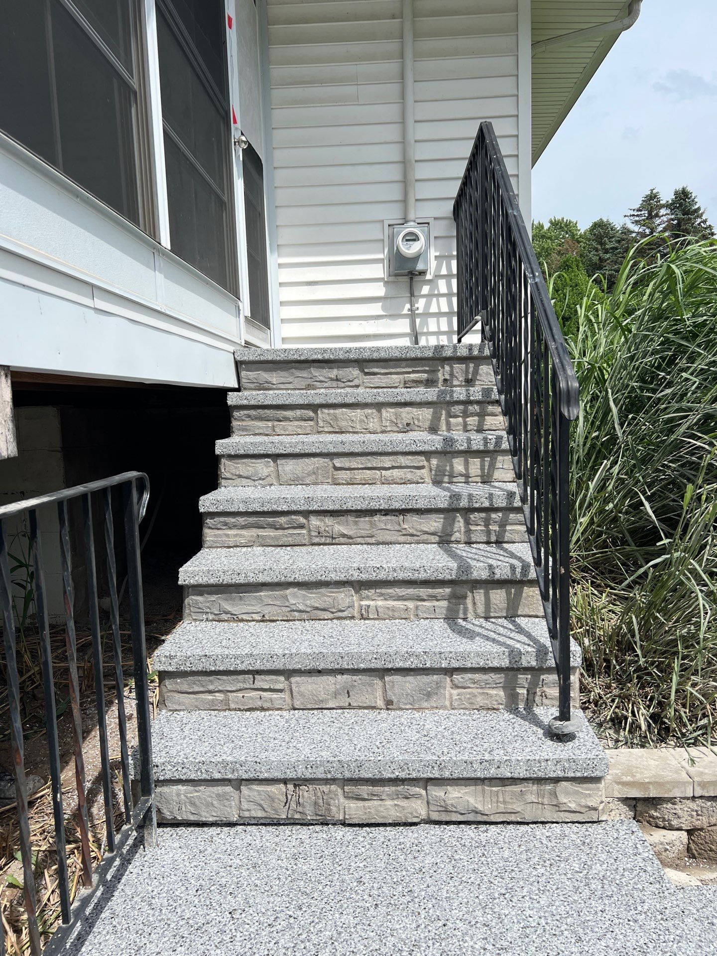Silverado porch and steps coating by NG Masonry & Construction LLC