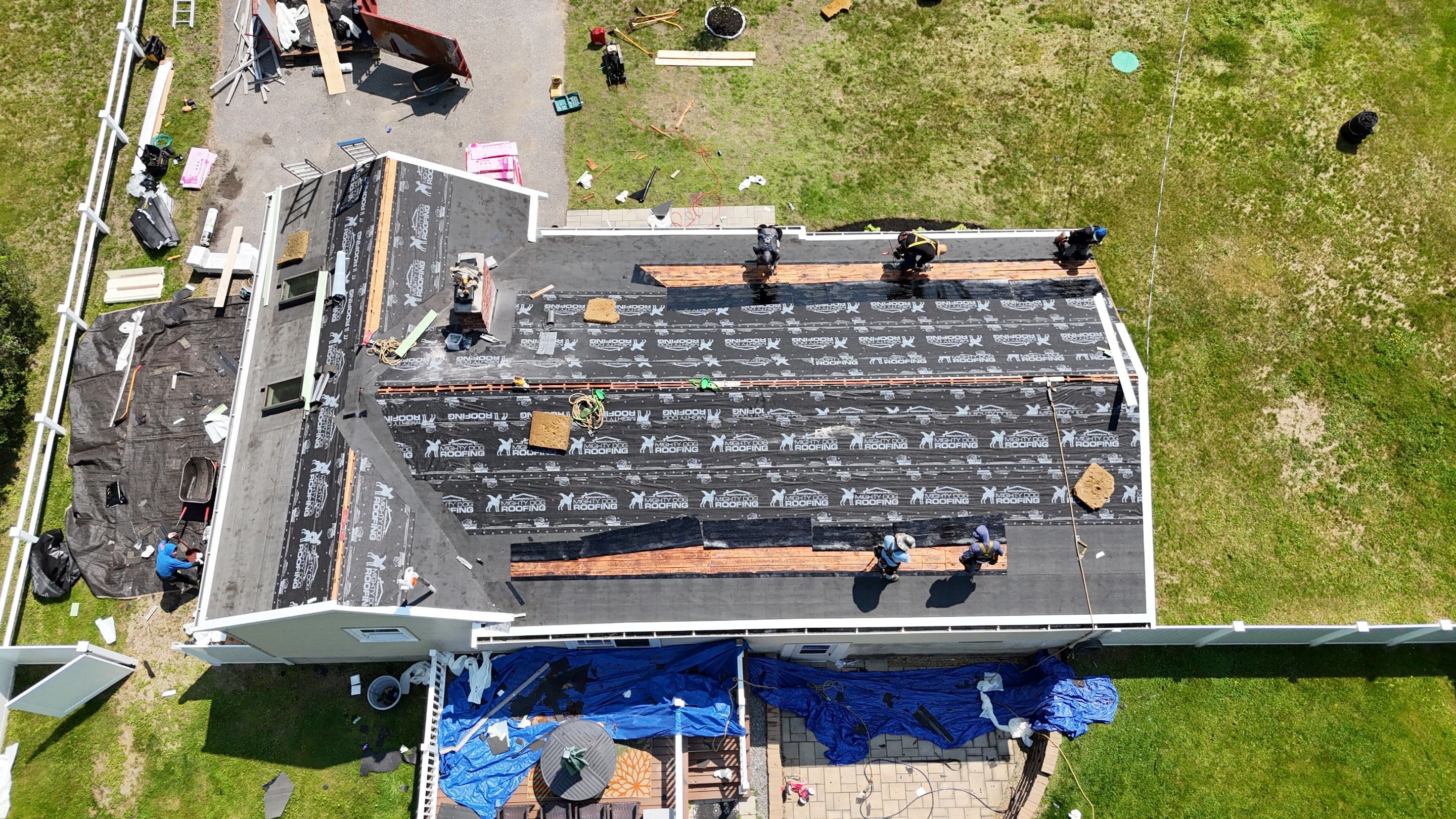 Full Roof Replacement & Chimney Repair – Onyx Black, MA by Mighty Dog Roofing of Greater Middlesex County