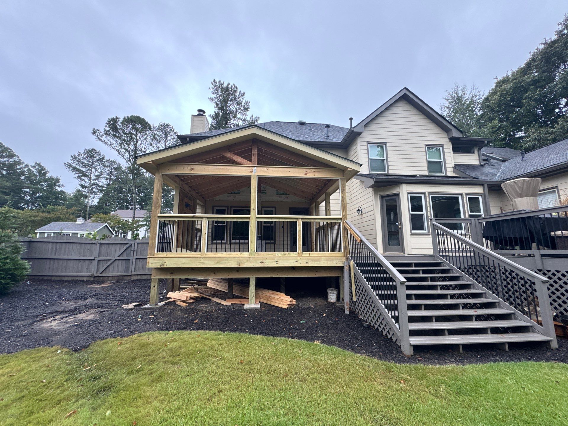 Custom Multi-Level Composite Deck and Screened-In Porch in Marietta by Swift Home Renovations