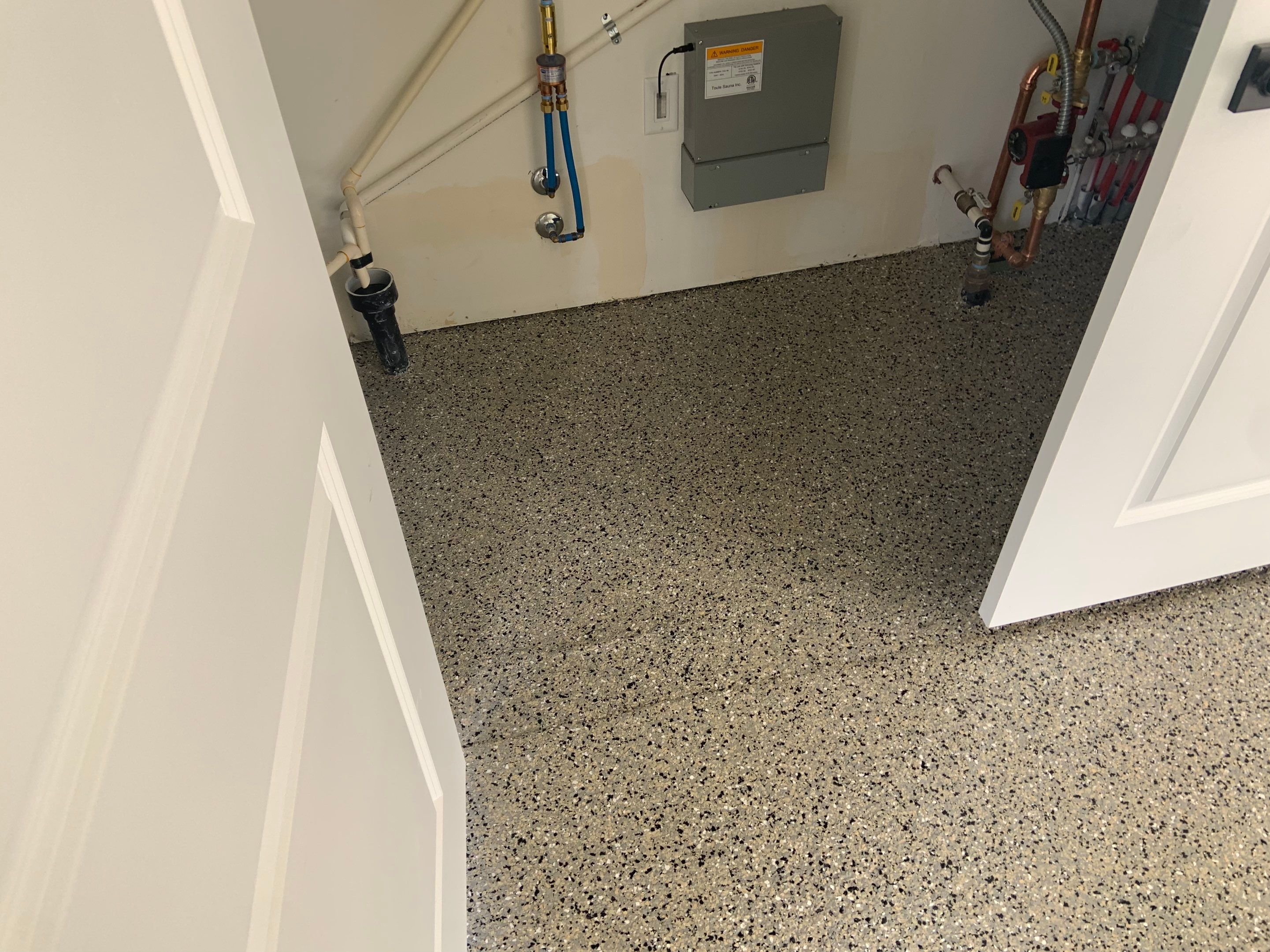 Garage Transformation using Mediterranean Colorway by Croc Coatings, LLC