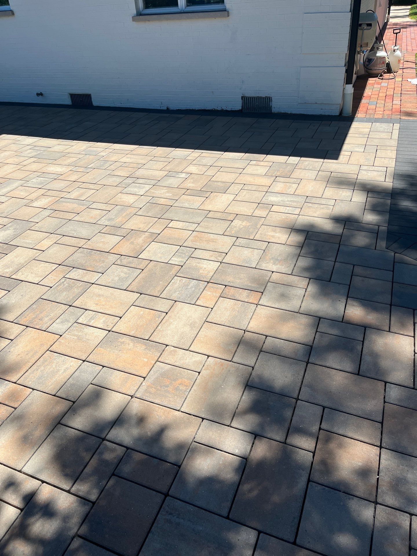 Brick paver repair, cleaning and sealing by Northern Power Washing LLC.