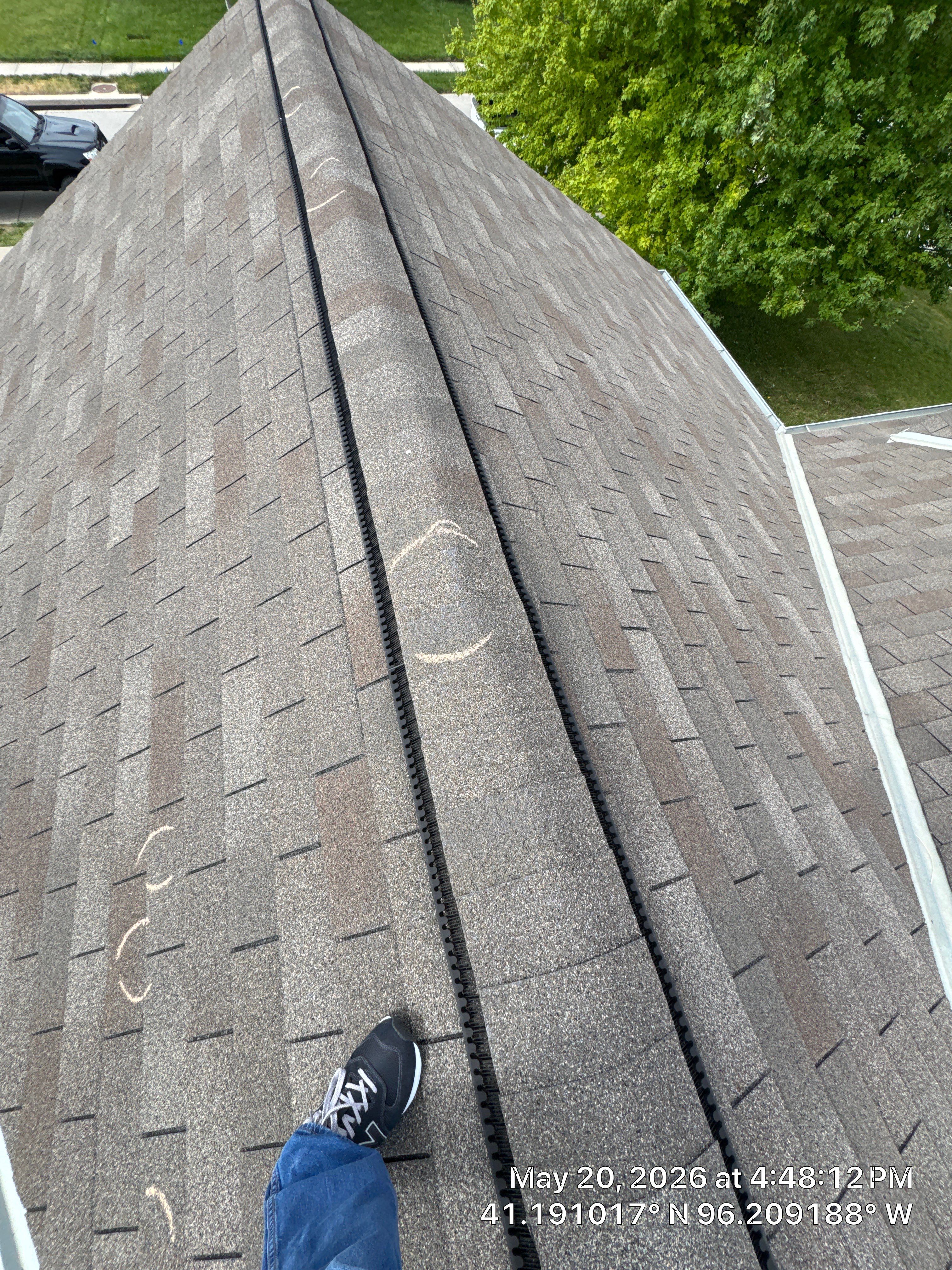 Storm Damage Restoration for Residential Asphalt Shingle Roof in Omaha by Crows Roofing LLC