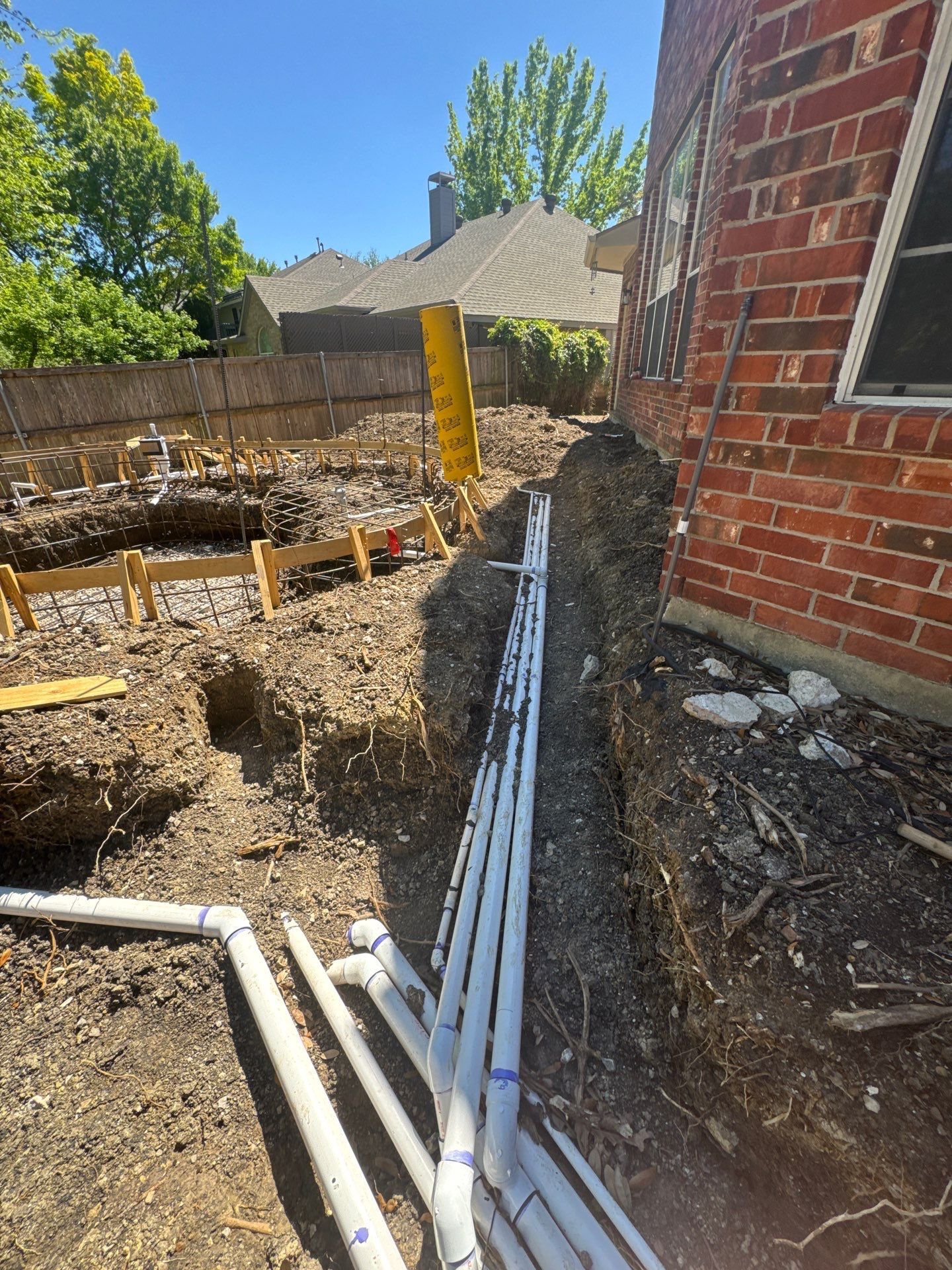 Freeform Pool with Rock Waterfall and Raised Spa by Pinnacle Pools and Spas - DFW