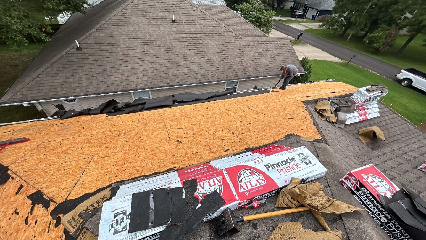 Residential Roof + Gutters & Downspouts Install  by Titan Commercial & Residential Roofing 