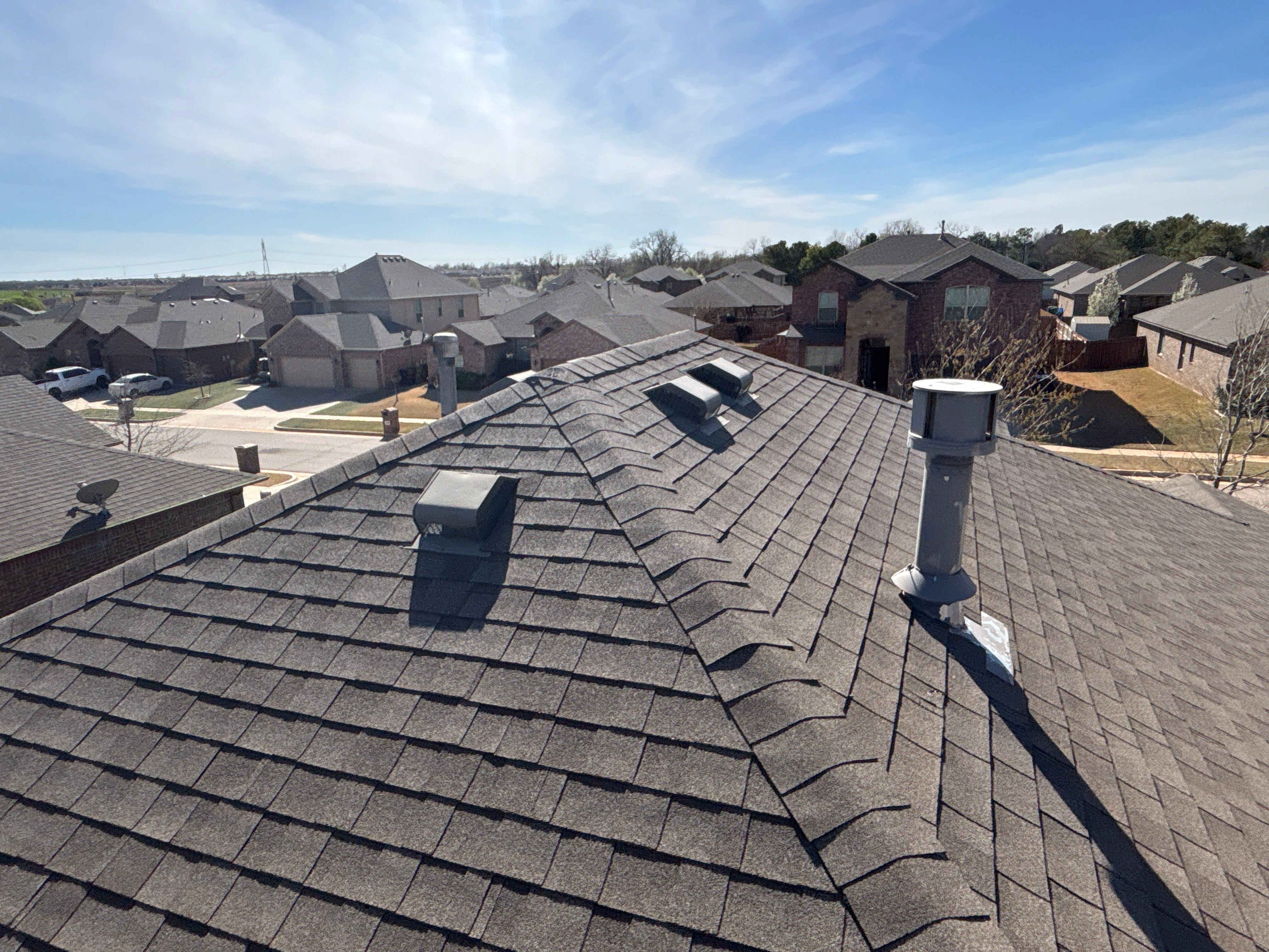 Storm Restoration in Yukon, OK by 5Coat Roofing & Construction