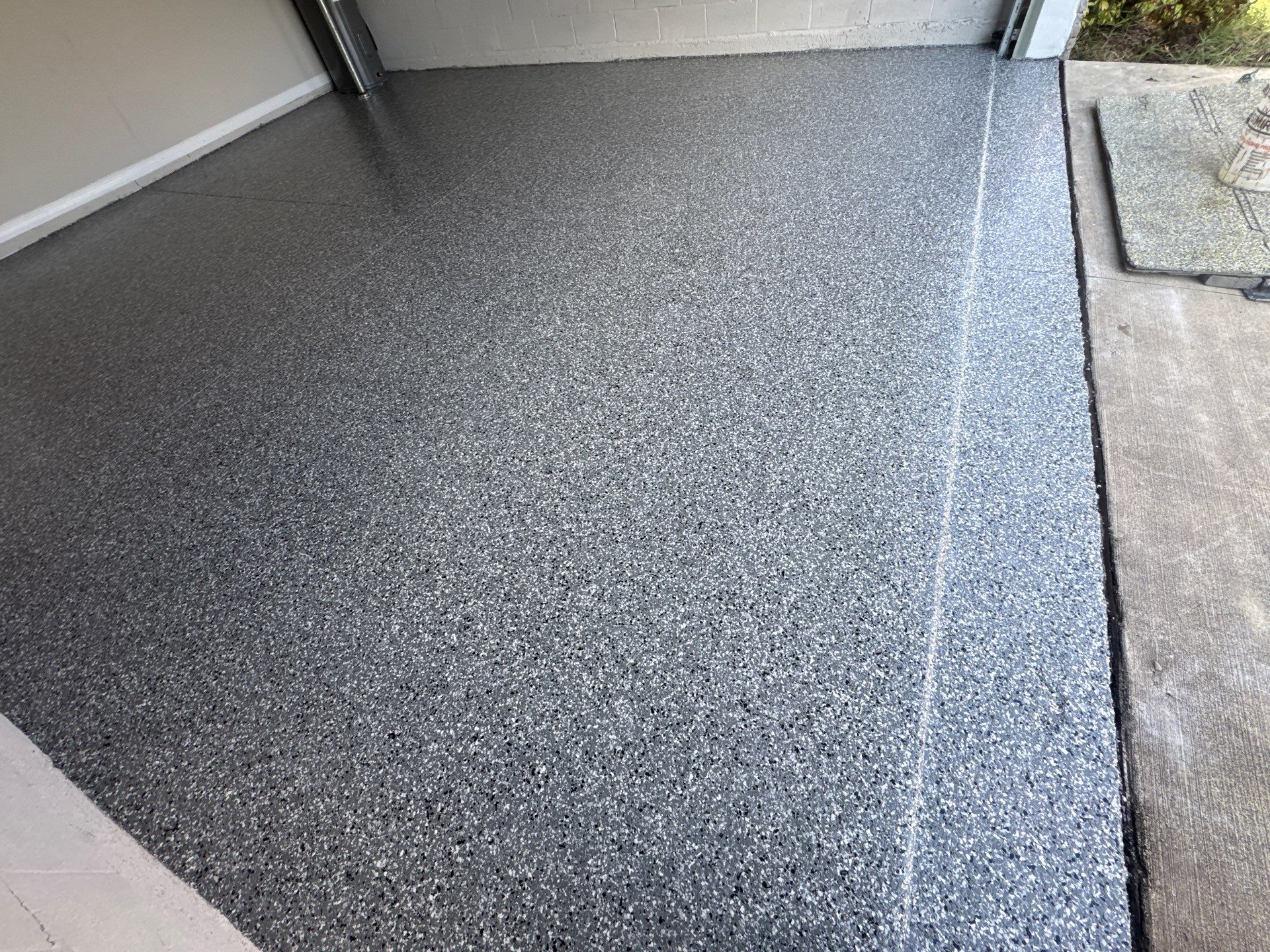 Another Wonderful Garage Transformation Using Wombat Flake by Performance Floors & Coating