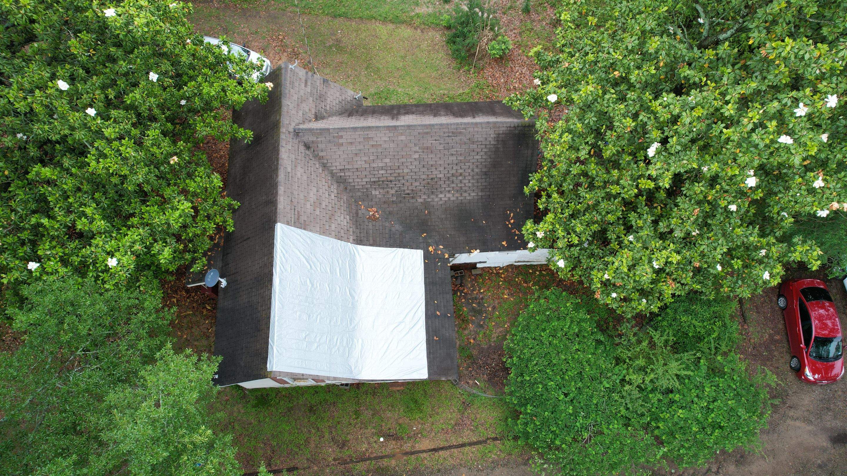 Storm Restoration Reroof: 25 Year 3-Tab Shingle by Hostetler Roofing