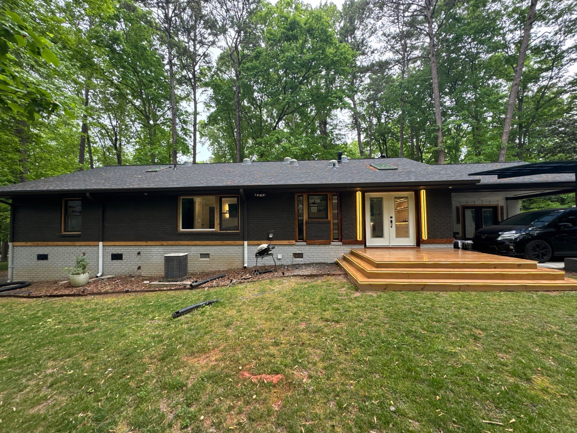 Modern Exterior Transformation and Multi-Tiered Deck Installation in Decatur by Swift Home Renovations
