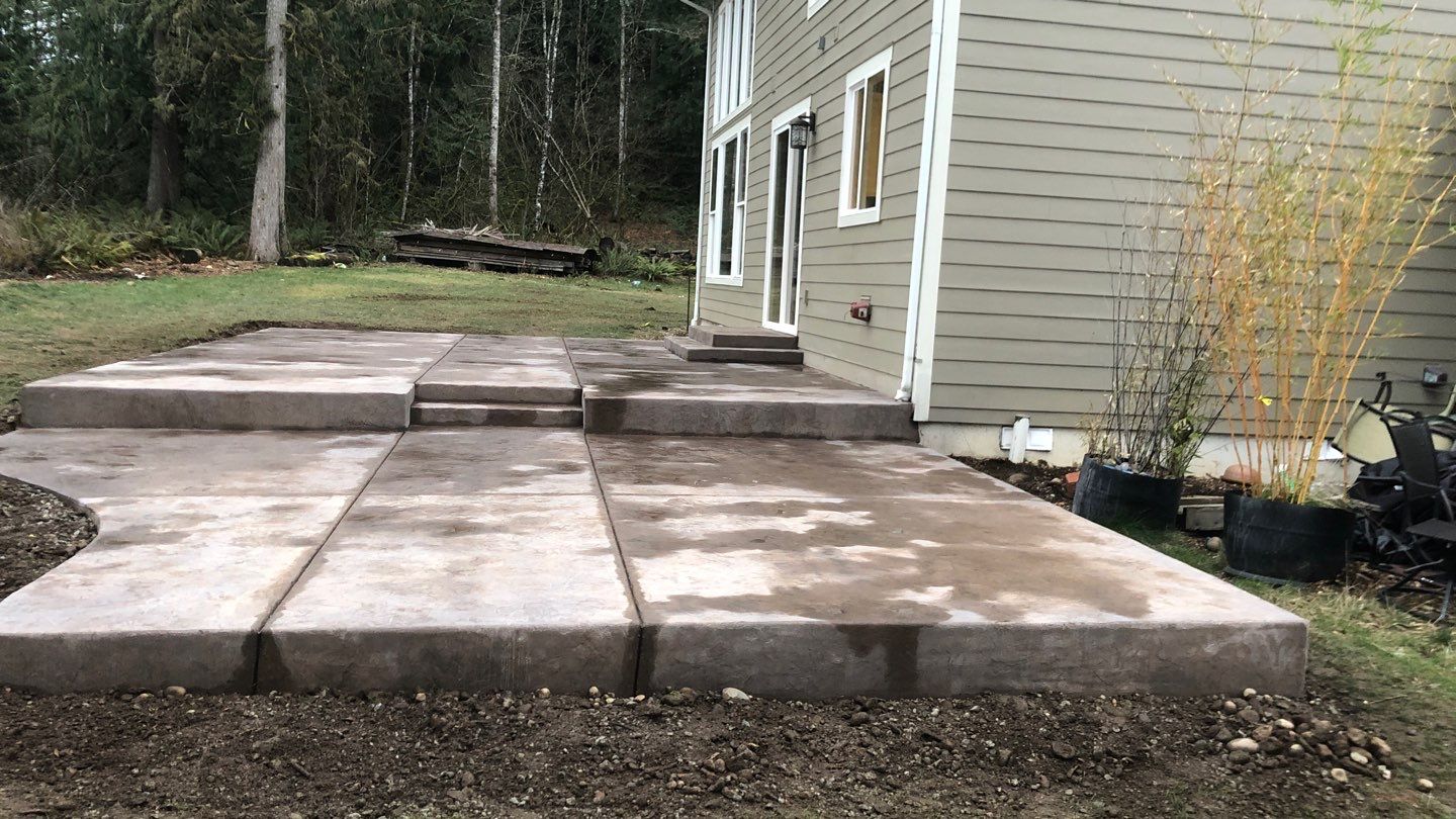 Mandy | Stamped Concrete Patio & Driveway by Jireh Asphalt & Concrete Inc 