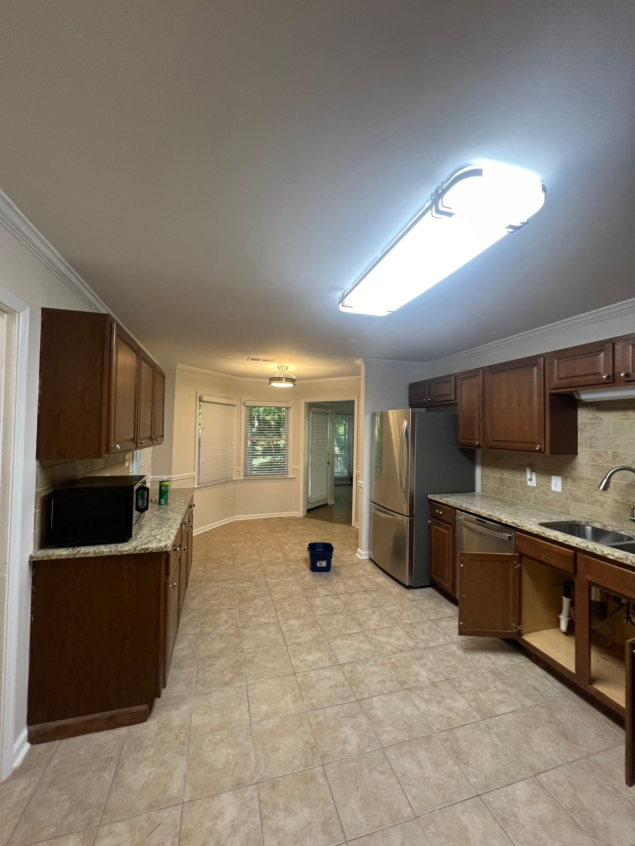 Dark Hardwood Floor Installation and Interior Painting in Marietta by Swift Home Renovations