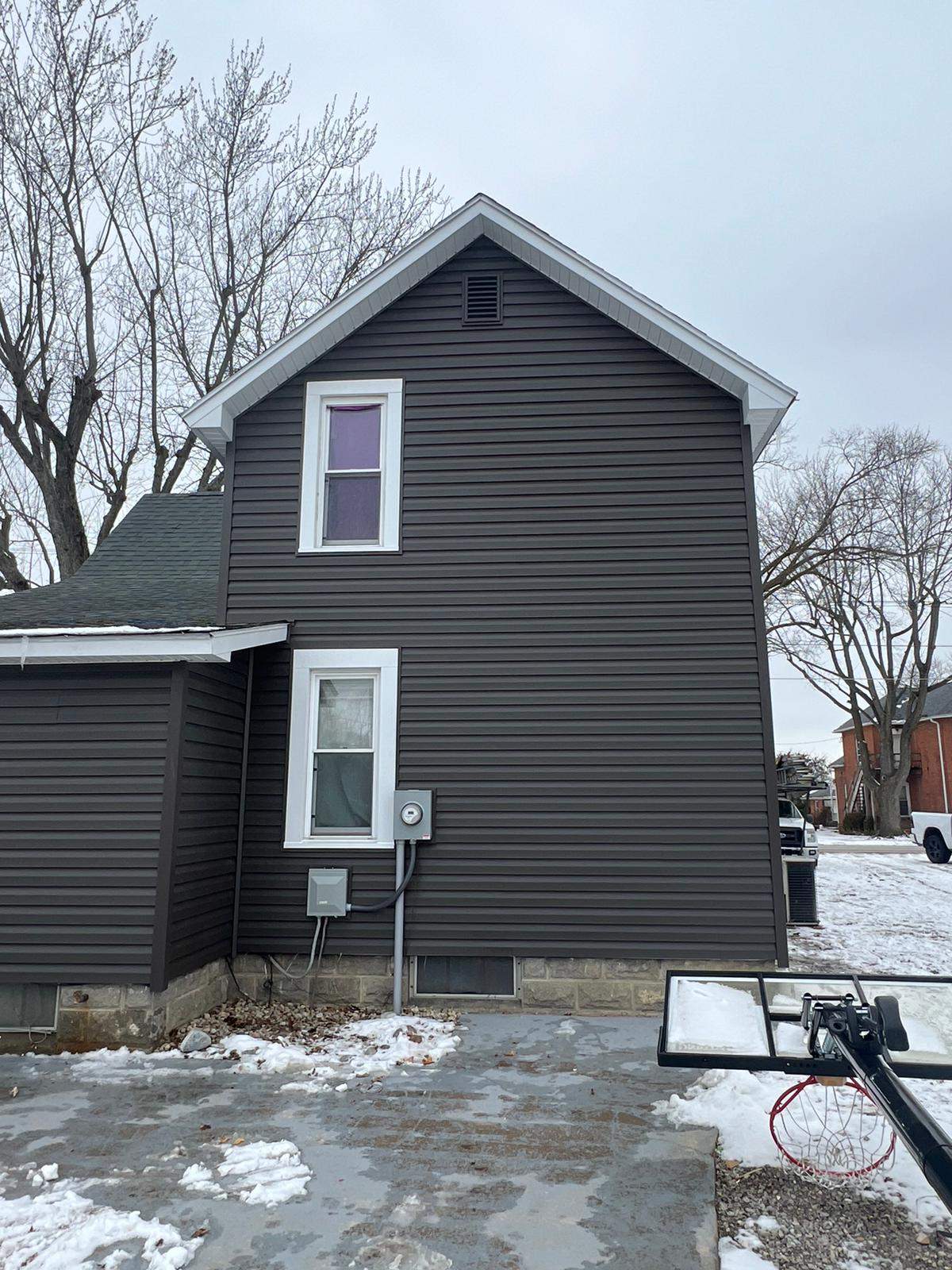 Residential fascia replacement using Exterior Portfolio 4.5 DL - Peppercorn by Nitro Roofing and Construction