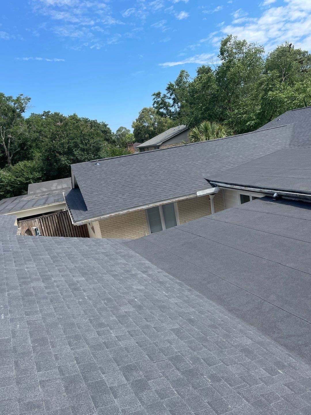 Residential Roofing Installation using Roof Replacement by American Roofing & Construction LLC